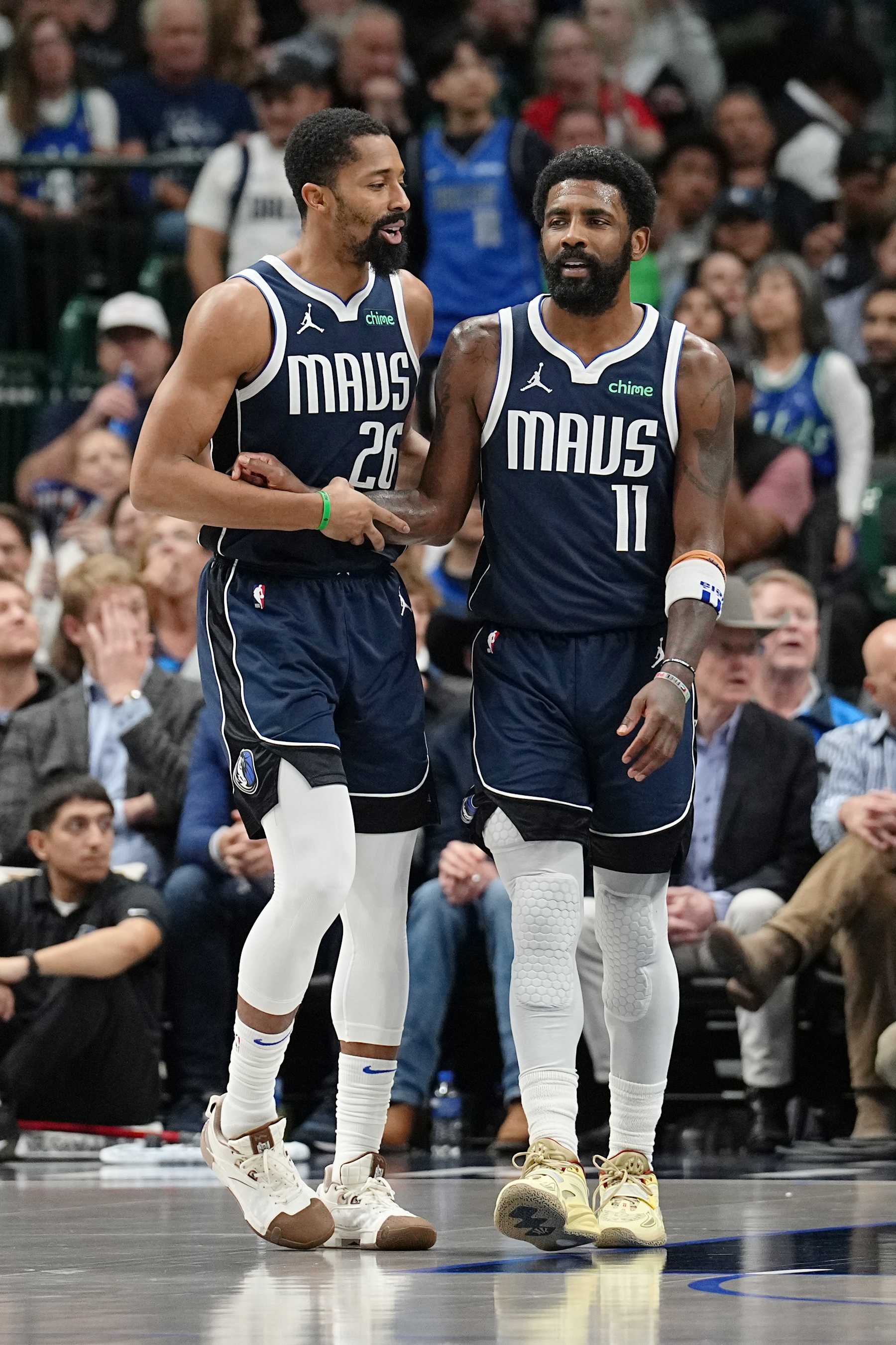 DALLAS, TX - NOVEMBER 8: Kyrie Irving #11 and Spencer Dinwiddie #26 of the Dallas Mavericks celebrate before the game against the Phoenix Suns on November 6, 2024 at the American Airlines Center in Dallas, Texas. NOTE TO USER: User expressly acknowledges and agrees that, by downloading and or using this photograph, User is consenting to the terms and conditions of the Getty Images License Agreement. Mandatory Copyright Notice: Copyright 2024 NBAE (Photo by Glenn James/NBAE via Getty Images)