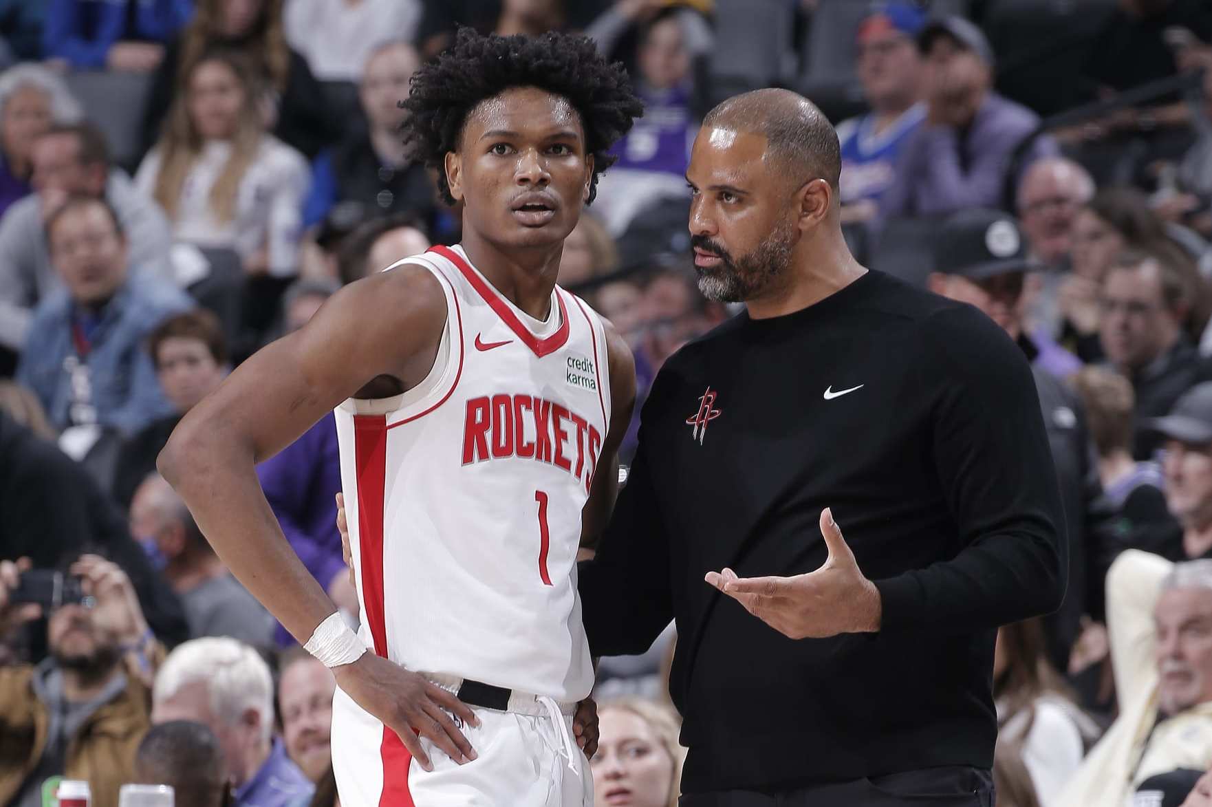SACRAMENTO, CA - MARCH 10: Head Coach Ime Udoka of the Houston Rockets coaches Amen Thompson #1 during the game against the Sacramento Kings on March 10, 2024 at Golden 1 Center in Sacramento, California. NOTE TO USER: User expressly acknowledges and agrees that, by downloading and or using this photograph, User is consenting to the terms and conditions of the Getty Images Agreement. Mandatory Copyright Notice: Copyright 2024 NBAE (Photo by Rocky Widner/NBAE via Getty Images)