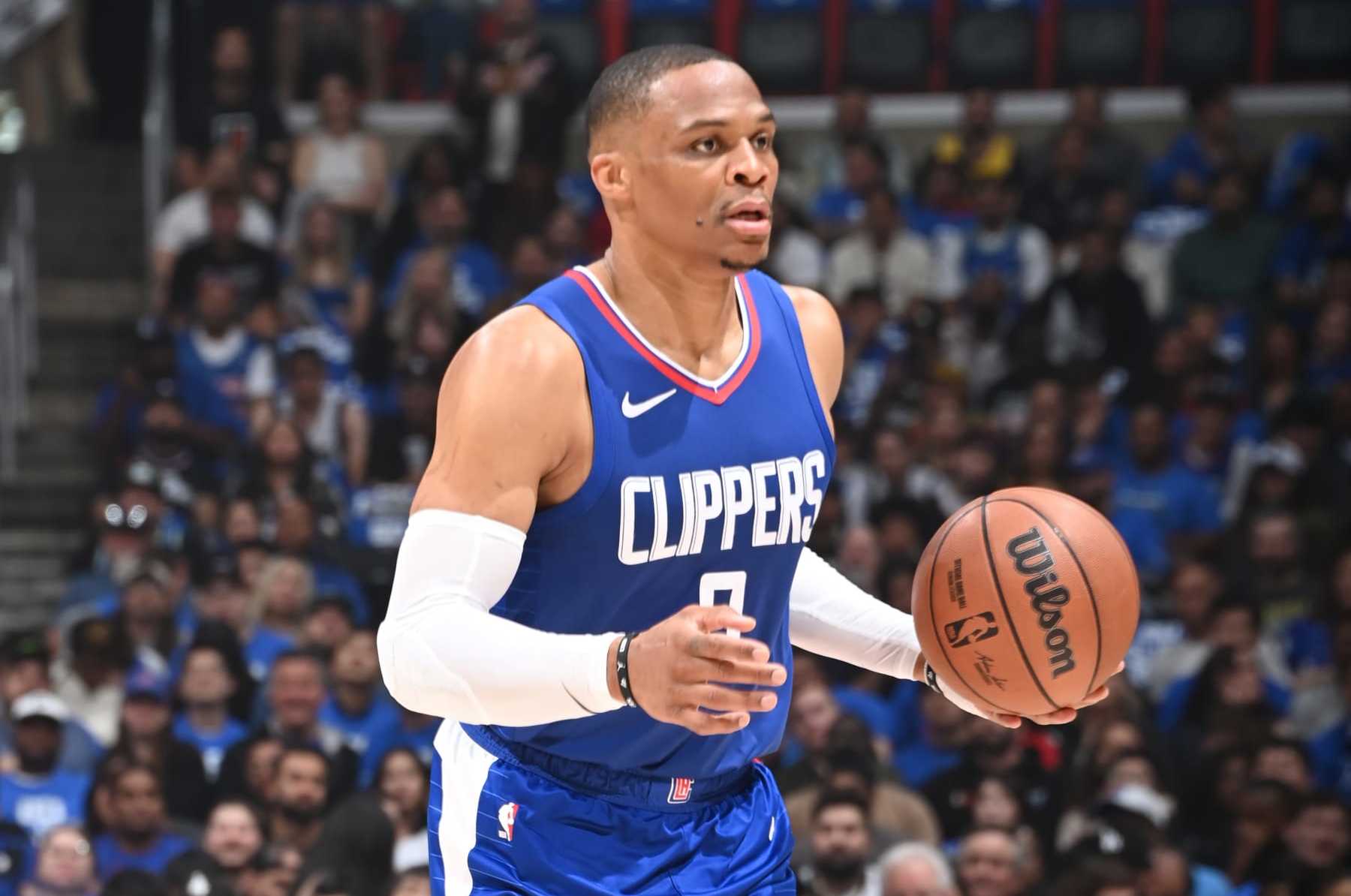 LOS ANGELES, CA - APRIL 21: Russell Westbrook #0 of the LA Clippers dribbles the ball during the game against the Dallas Mavericks during the 2024 NBA Playoffs on April 21, 2024 at Crypto.Com Arena in Los Angeles, California. NOTE TO USER: User expressly acknowledges and agrees that, by downloading and/or using this Photograph, user is consenting to the terms and conditions of the Getty Images License Agreement. Mandatory Copyright Notice: Copyright 2024 NBAE (Photo by Andrew D. Bernstein/NBAE via Getty Images)