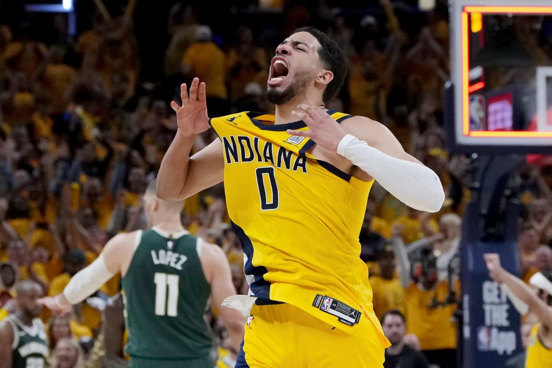 INDIANAPOLIS, INDIANA - APRIL 26: Tyrese Haliburton #0 of the Indiana Pacers celebrates after beating the Milwaukee Bucks 121-119 in overtime during game three of the Eastern Conference First Round Playoffs at Gainbridge Fieldhouse on April 26, 2024 in Indianapolis, Indiana. NOTE TO USER: User expressly acknowledges and agrees that, by downloading and or using this photograph, User is consenting to the terms and conditions of the Getty Images License Agreement. (Photo by Dylan Buell/Getty Images)