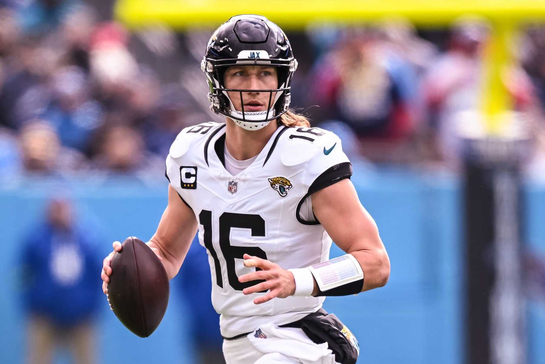 NASHVILLE, TN - JANUARY 07: Jacksonville Jaguars quarterback Trevor Lawrence (16) runs with the ball during the NFL game between the Tennessee Titans and the Jacksonville Jaguars on January 7, 2024, at Nissan Stadium in Nashville, TN. (Photo by Bryan Lynn/Icon Sportswire via Getty Images)