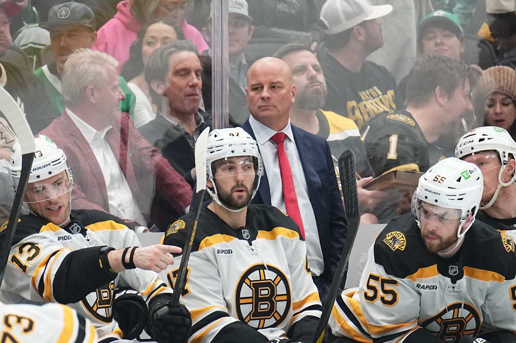 DALLAS, TX - NOVEMBER 14: Jim Montgomery watches the action from behind the bench against the Dallas Stars at the American Airlines Center on November 14, 2024 in Dallas, Texas. (Photo by Glenn James/NHLI via Getty Images)