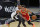 SAN ANTONIO, TX - APRIL 01:  Dejounte Murray #5 of the San Antonio Spurs tries to press Trae Young #11 of the Atlanta Hawks  in the second half at AT&T Center on April 1, 2021 in San Antonio, Texas.  NOTE TO USER: User expressly acknowledges and agrees that , by downloading and or using this photograph, User is consenting to the terms and conditions of the Getty Images License Agreement. (Photo by Ronald Cortes/Getty Images)