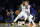 LOS ANGELES, CALIFORNIA - FEBRUARY 23:  D'Angelo Russell #1 of the Los Angeles Lakers controls the ball against Donte DiVincenzo #0 of the Golden State Warriors in the first half at Crypto.com Arena on February 23, 2023 in Los Angeles, California.  NOTE TO USER: User expressly acknowledges and agrees that, by downloading and/or using this photograph, user is consenting to the terms and conditions of the Getty Images License Agreement.  (Photo by Ronald Martinez/Getty Images)