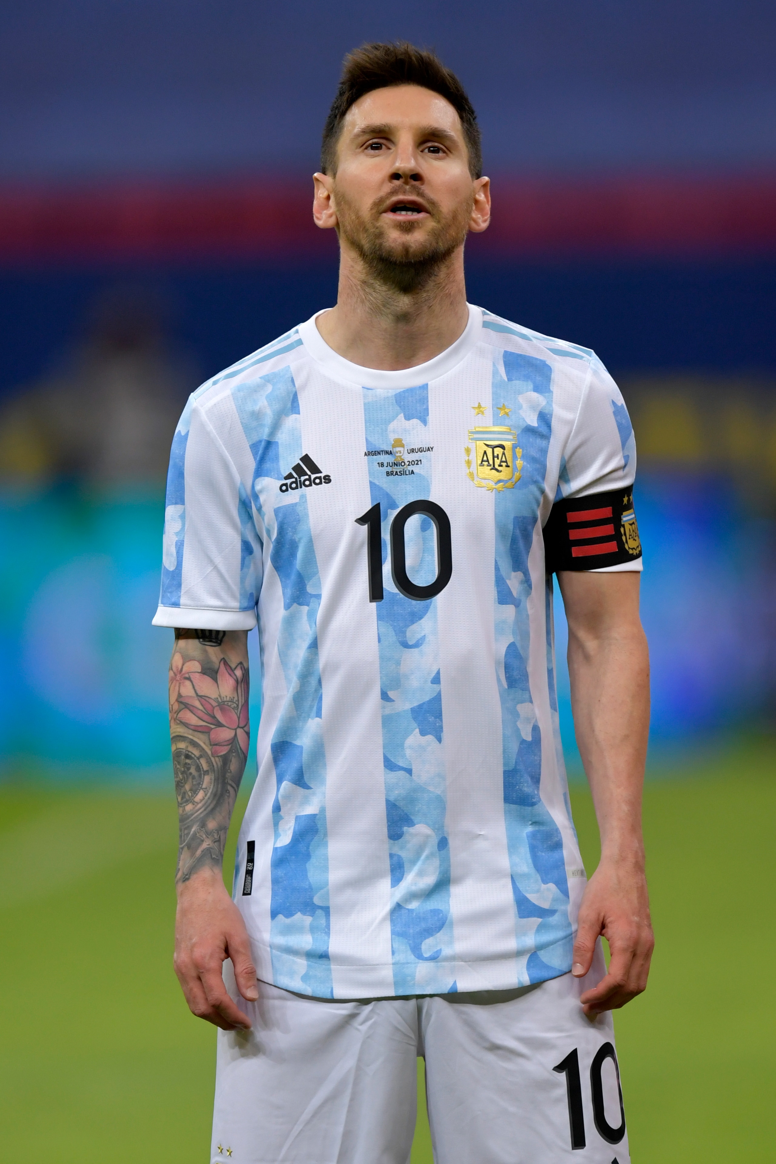 BRASILIA, BRAZIL - JUNE 18: Lionel Messi of Argentina sing s the national anthem prior to a group A match between Argentina and Chile as part of Conmebol Copa America Brazil 2021 at Mane Garrincha Stadium on June 18, 2021 in Brasilia, Brazil. (Photo by Pedro Vilela/Getty Images)