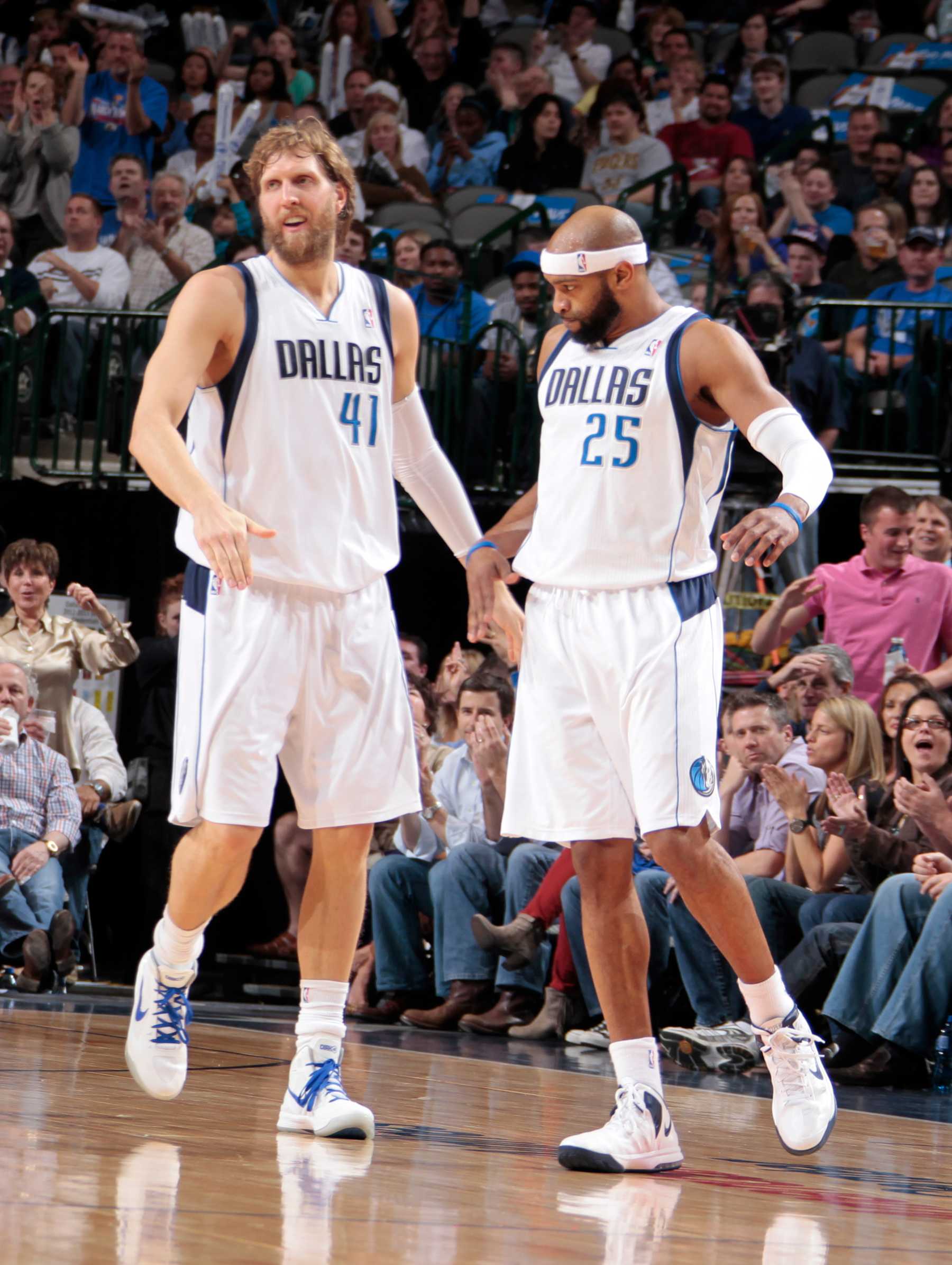 DALLAS, TX - MARCH 28:  Dirk Nowitzki #41 and Vince Carter #25 of the Dallas Mavericks celebrate a play against the Indiana Pacers on March 28, 2013 at the American Airlines Center in Dallas, Texas. NOTE TO USER: User expressly acknowledges and agrees that, by downloading and or using this photograph, User is consenting to the terms and conditions of the Getty Images License Agreement. Mandatory Copyright Notice: Copyright 2013 NBAE (Photo by Danny Bollinger/NBAE via Getty Images)