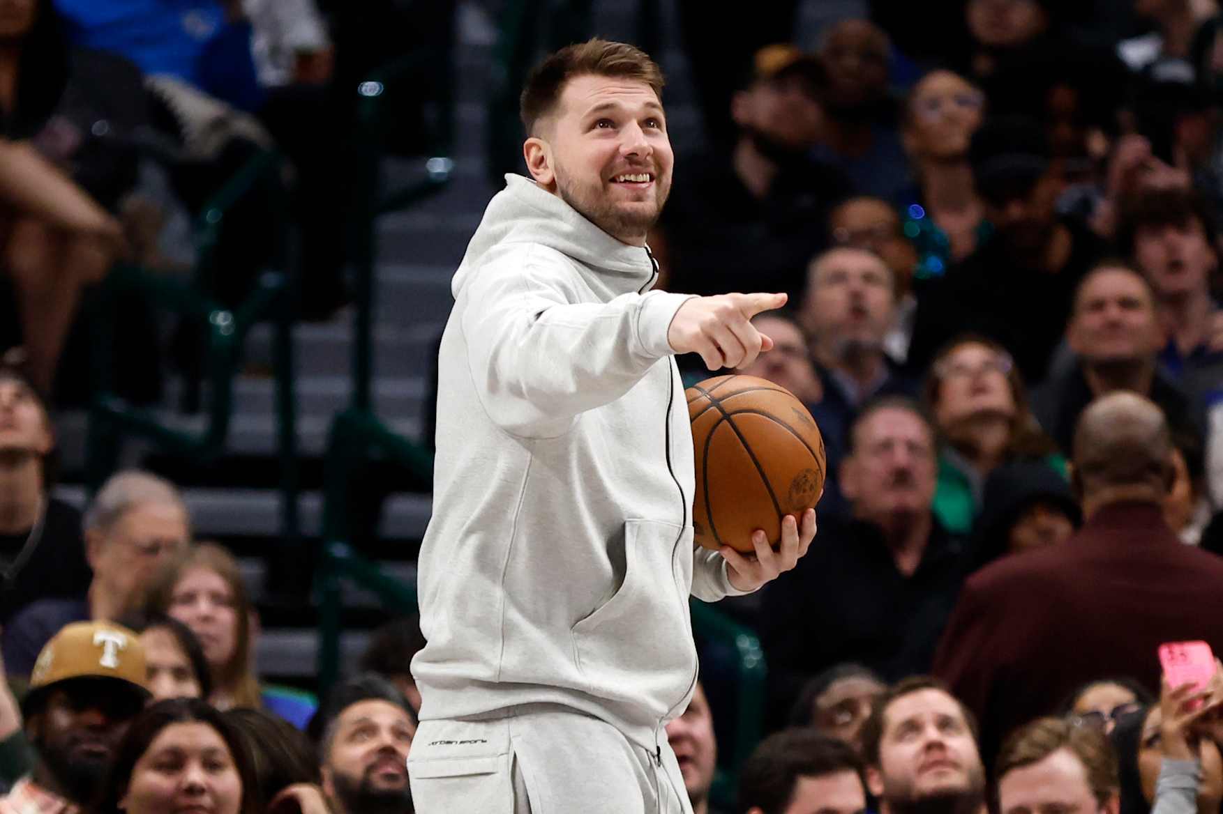 DALLAS, TX - JANUARY 22: Luka Doncic #77 of the Dallas Mavericks looks on during a timeout in the game against the Minnesota Timberwolves in the second half at American Airlines Center on January 22, 2025 in Dallas, Texas. NOTE TO USER: User expressly acknowledges and agrees that, by downloading and or using this photograph, User is consenting to the terms and conditions of the Getty Images License Agreement. (Photo by Ron Jenkins/Getty Images)
