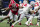 Georgia defensive lineman Jalen Carter chases Ohio State quarterback C.J. Stroud during the Peach Bowl. 
