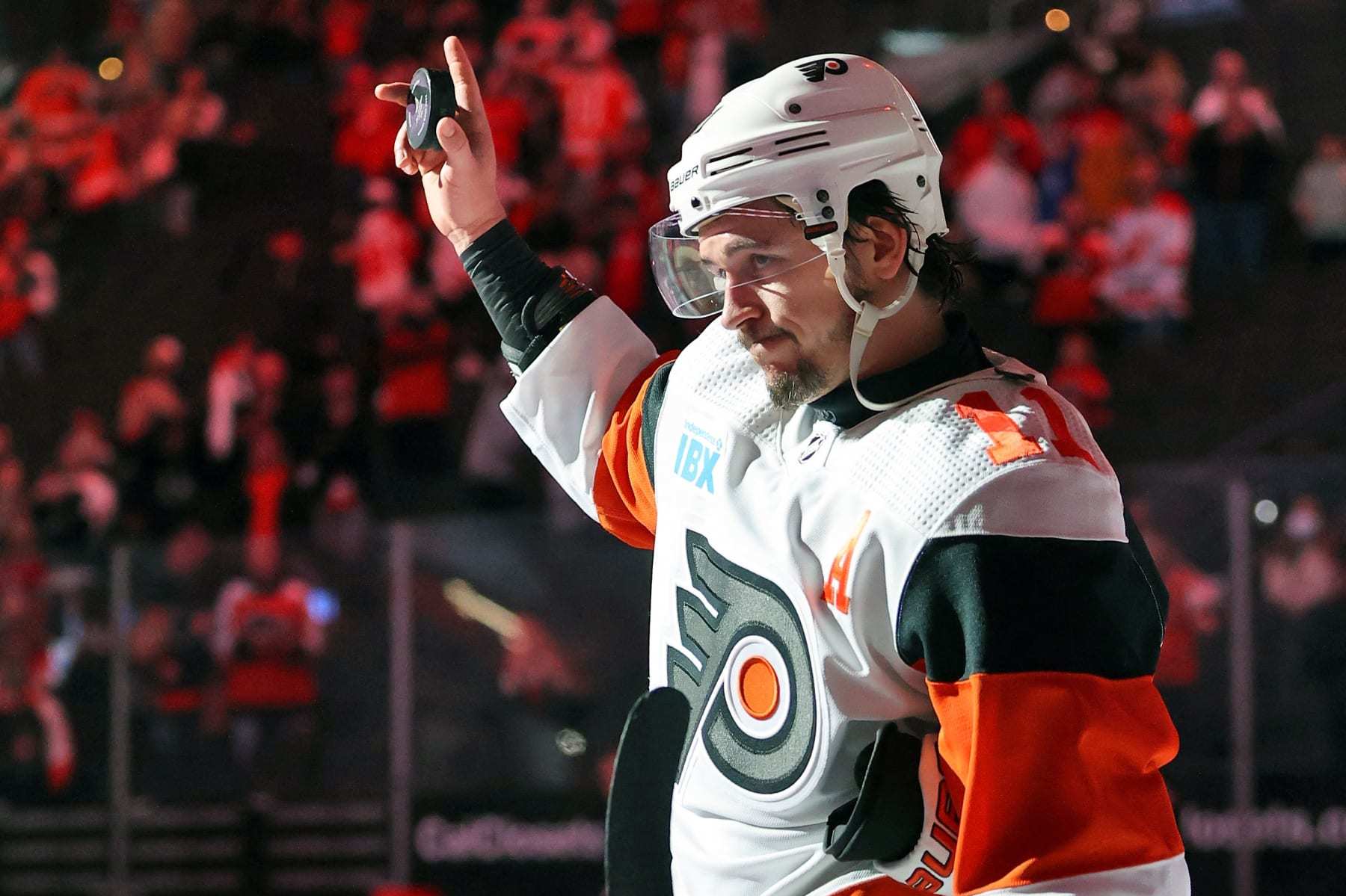 PHILADELPHIA, PENNSYLVANIA - APRIL 13: Travis Konecny #11 of the Philadelphia Flyers acknowledges the crowd after scoring the only goal in his team's 1-0 win against the New Jersey Devils at the Wells Fargo Center on April 13, 2024 in Philadelphia, Pennsylvania. The goal was Konecny's 400th point of his NHL career. (Photo by Len Redkoles/NHLI via Getty Images)