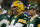 GREEN BAY, WI - NOVEMBER 6:  Quarterbacks Brett Favre #4 and Aaron Rodgers #12 of the Green Bay Packers watch the final minutes of a game against the Pittsburgh Steelers from the sideline November 6, 2005 at Lambeau Field in Green Bay, Wisconsin. The Steelers defeated the Packers, 20-10.  (Photo by Jonathan Daniel/Getty Images)