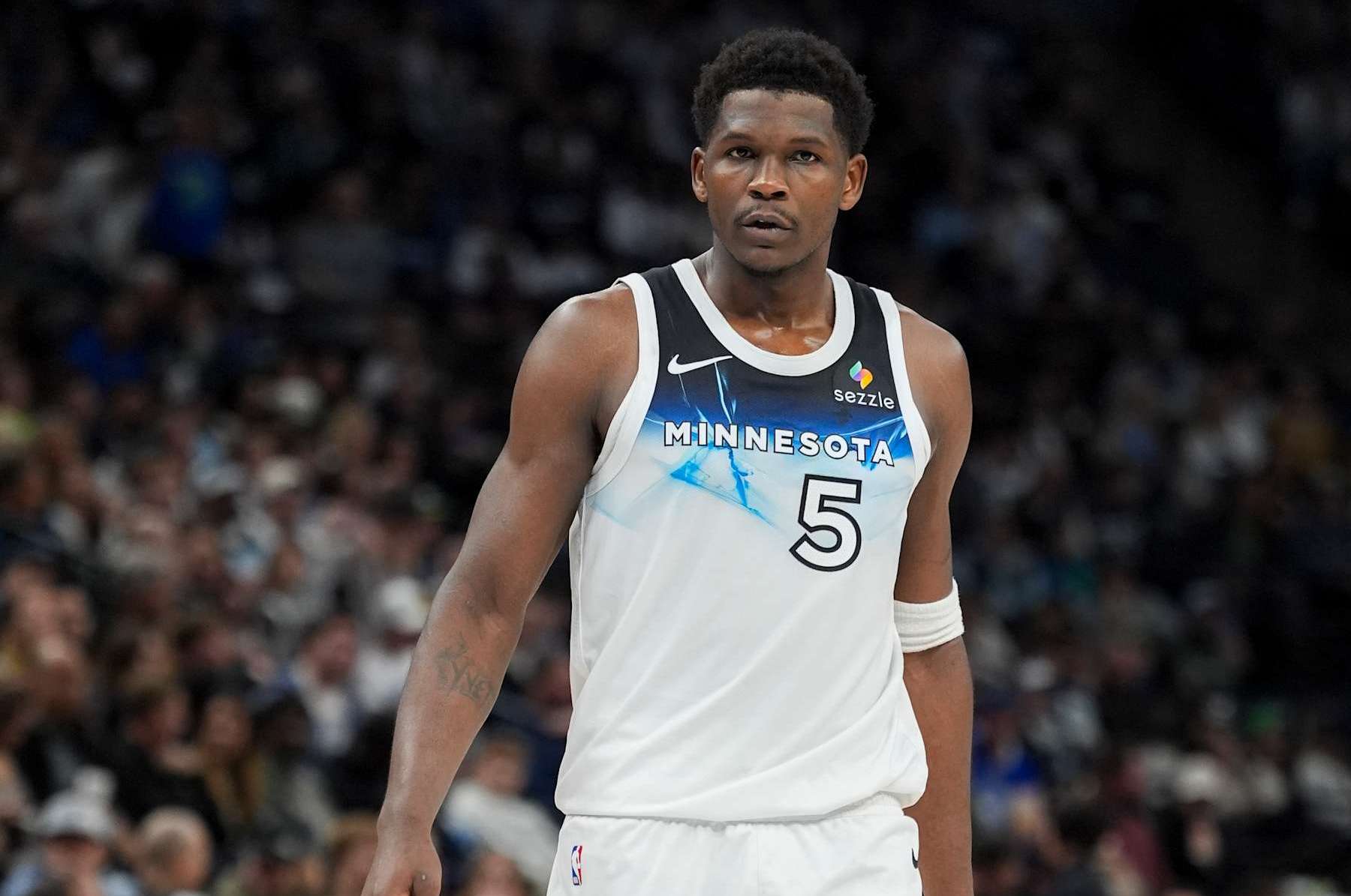 MINNEAPOLIS, MN -  NOVEMBER 27:  Anthony Edwards #5 of the Minnesota Timberwolves looks on during the game against the Sacramento Kings on November 27, 2024 at Target Center in Minneapolis, Minnesota. NOTE TO USER: User expressly acknowledges and agrees that, by downloading and or using this Photograph, user is consenting to the terms and conditions of the Getty Images License Agreement. Mandatory Copyright Notice: Copyright 2024 NBAE (Photo by Jordan Johnson/NBAE via Getty Images)