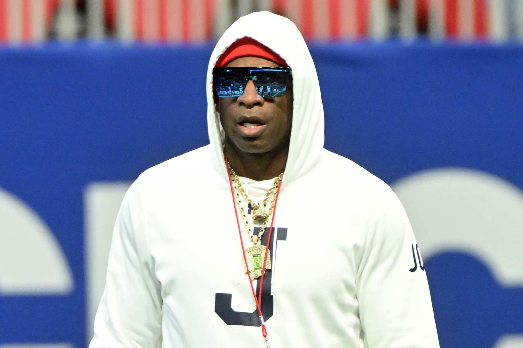 Deion Sanders makes appearances not wearing Nike-branded apparel despite  Colorado's deal