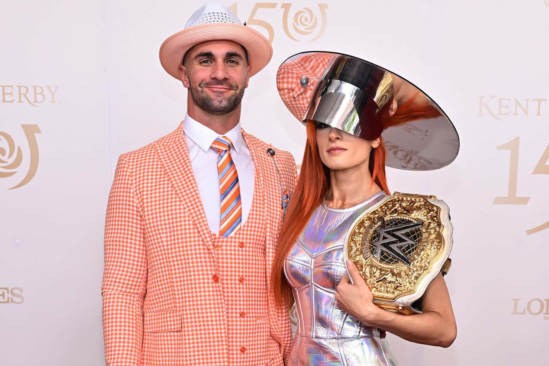LOUISVILLE, KENTUCKY - MAY 04: (L-R) Seth Rollins and Becky Lynch attend the Kentucky Derby 150 at Churchill Downs on May 04, 2024 in Louisville, Kentucky. (Photo by Daniel Boczarski/Getty Images for Churchill Downs)