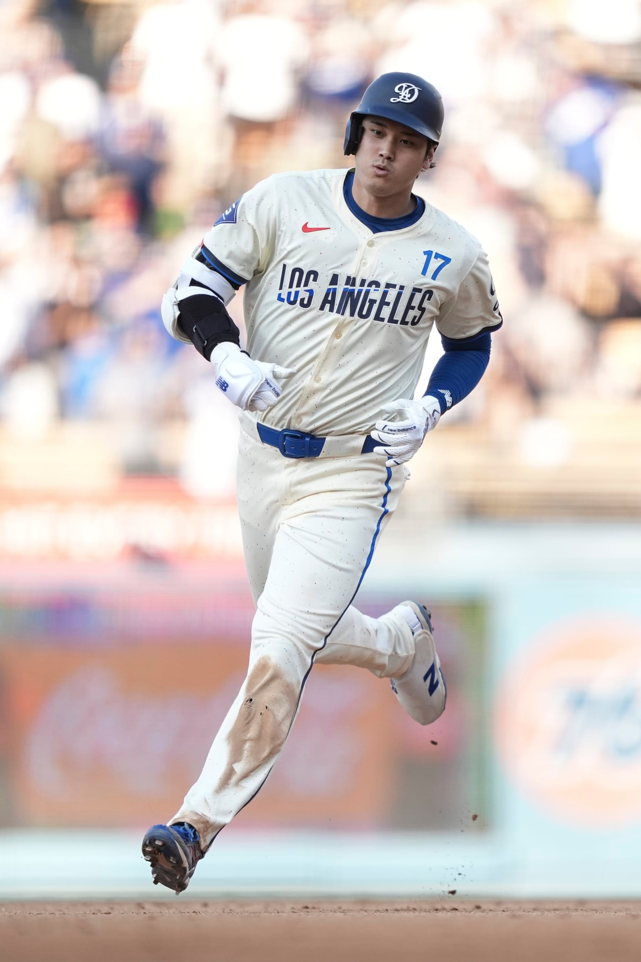LOS ANGELES, CALIFORNIA - JULY 06: Shohei Ohtani #17 of the Los Angeles Dodgers rounds the bases after hitting a solo home run against the Milwaukee Brewers during the eighth inning at Dodger Stadium on July 06, 2024 in Los Angeles, California. (Photo by Michael Owens/Getty Images) LOS ANGELES, CALIFORNIA - JULY 06: Shohei Ohtani #17 of the Los Angeles Dodgers rounds the bases after hitting a solo home run against the Milwaukee Brewers during the eighth inning at Dodger Stadium on July 06, 2024 in Los Angeles, California. (Photo by Michael Owens/Getty Images)
