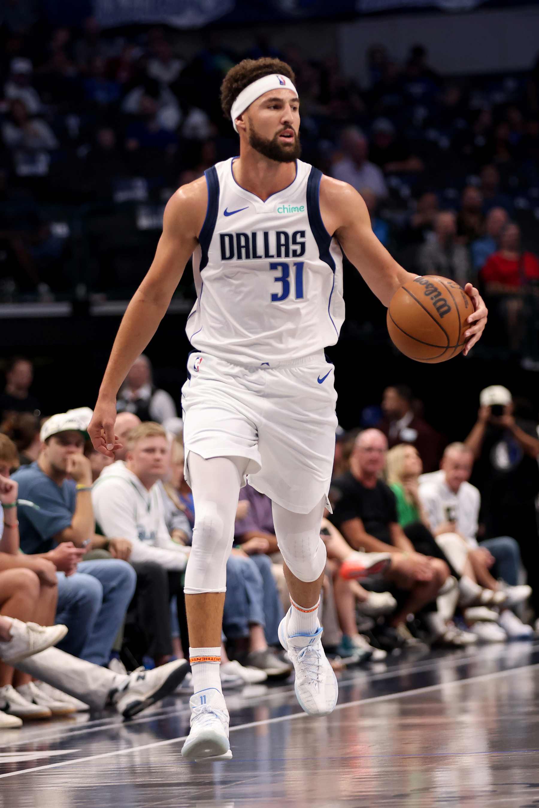DALLAS, TEXAS - OCTOBER 10: Klay Thompson #31 of the Dallas Mavericks brings the ball up court against the Utah Jazz during the first quarter at American Airlines Center on October 10, 2024 in Dallas, Texas. NOTE TO USER: User expressly acknowledges and agrees that, by downloading and or using this Photograph, user is consenting to the terms and conditions of the Getty Images License Agreement. Mandatory Copyright Notice: Copyright 2024 NBAE  (Photo by Tim Heitman/Getty Images)