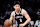 NEW YORK, NEW YORK - OCTOBER 27: Yongxi Cui #8 of the Brooklyn Nets dribbles the ball against the Milwaukee Bucks during the fourth quarter at Barclays Center on October 27, 2024 in the Brooklyn borough of New York City. (Photo by Luke Hales/Getty Images)