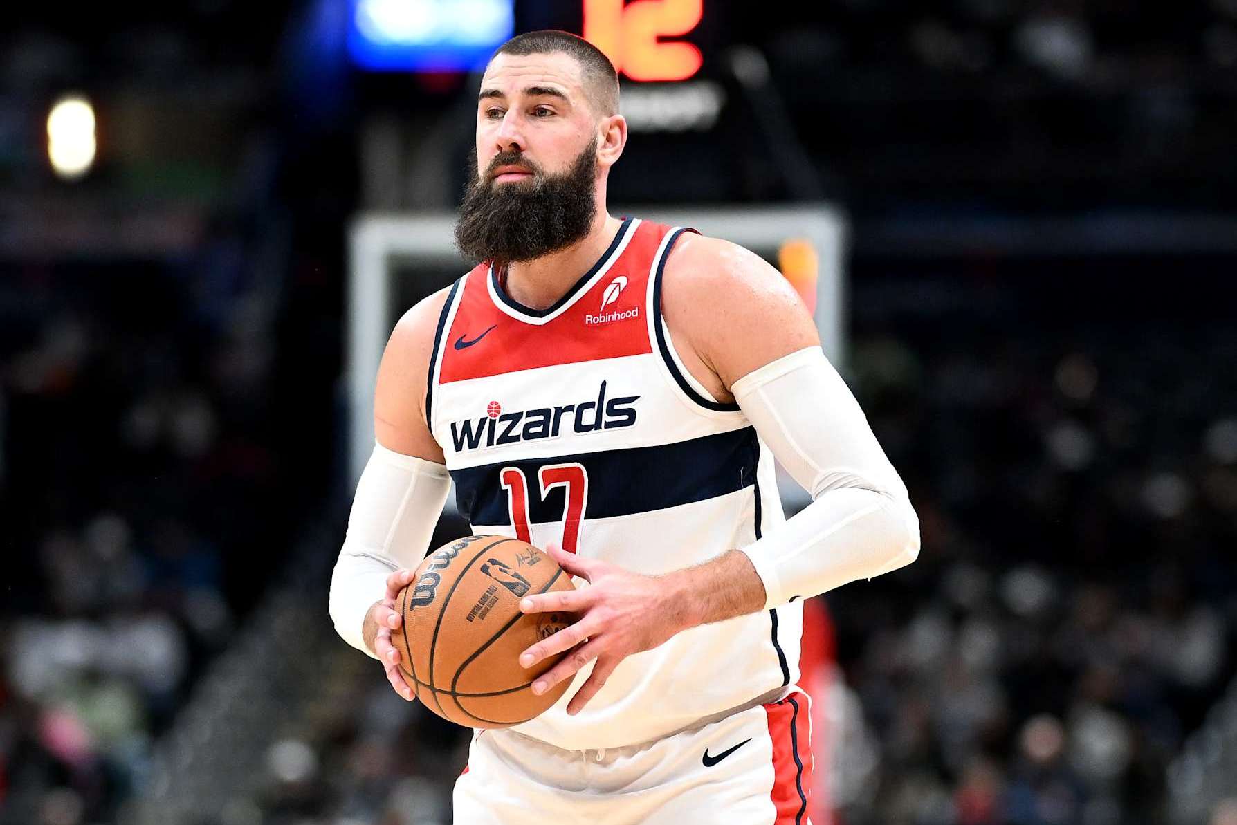 WASHINGTON, DC - DECEMBER 19: Jonas Valanciunas #17 of the Washington Wizards handles the ball against the Charlotte Hornets at Capital One Arena on December 19, 2024 in Washington, DC. NOTE TO USER: User expressly acknowledges and agrees that, by downloading and or using this photograph, User is consenting to the terms and conditions of the Getty Images License Agreement.  (Photo by G Fiume/Getty Images)