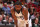 MIAMI, FL - APRIL 10:  Kyrie Irving #11 of the Dallas Mavericks looks on during the game against the Miami Heat on April 10, 2024 at Kaseya Center in Miami, Florida. NOTE TO USER: User expressly acknowledges and agrees that, by downloading and or using this Photograph, user is consenting to the terms and conditions of the Getty Images License Agreement. Mandatory Copyright Notice: Copyright 2024 NBAE (Photo by Issac Baldizon/NBAE via Getty Images)