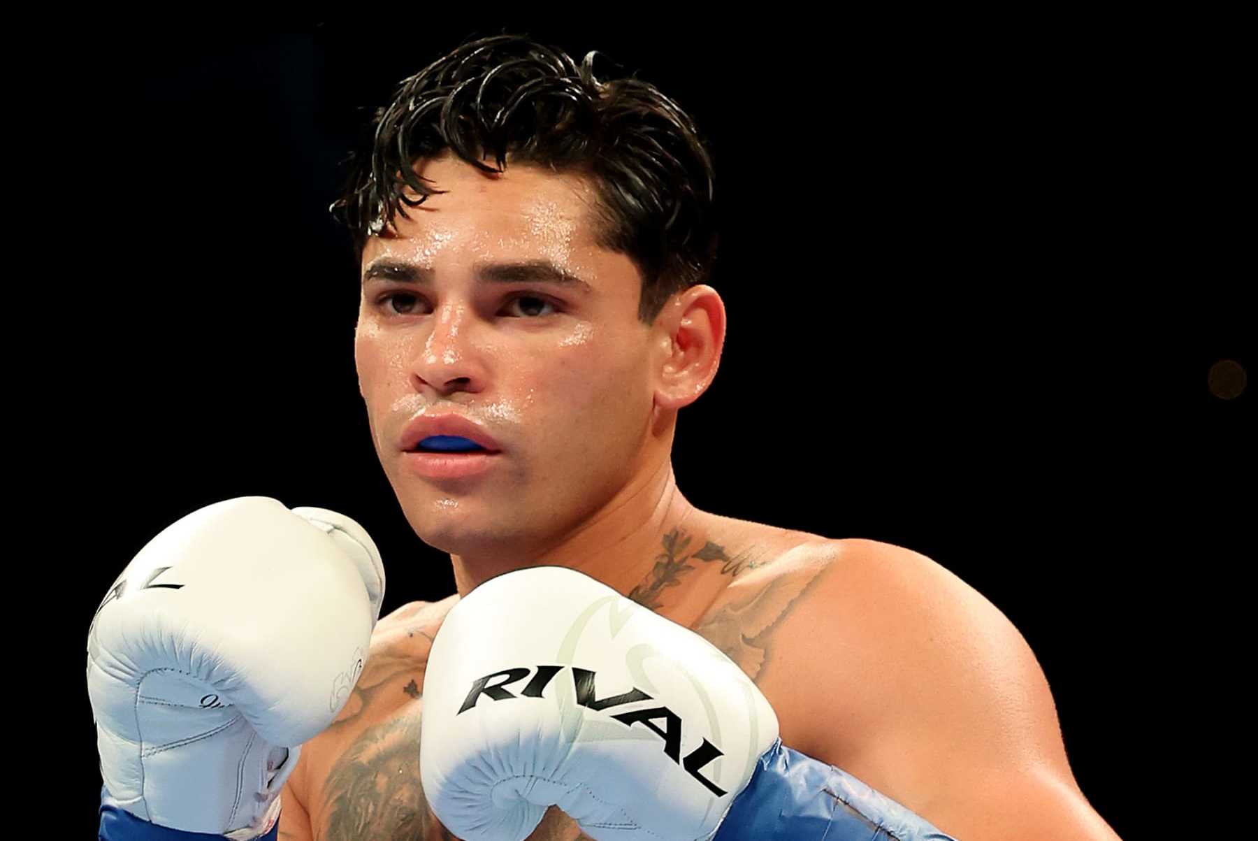 NEW YORK, NEW YORK - APRIL 20: Ryan Garcia (white trunks) prepares to fight Devin Haney during their WBC Super Lightweight title bout at Barclays Center on April 20, 2024 in New York City. (Photo by Al Bello/Getty Images)