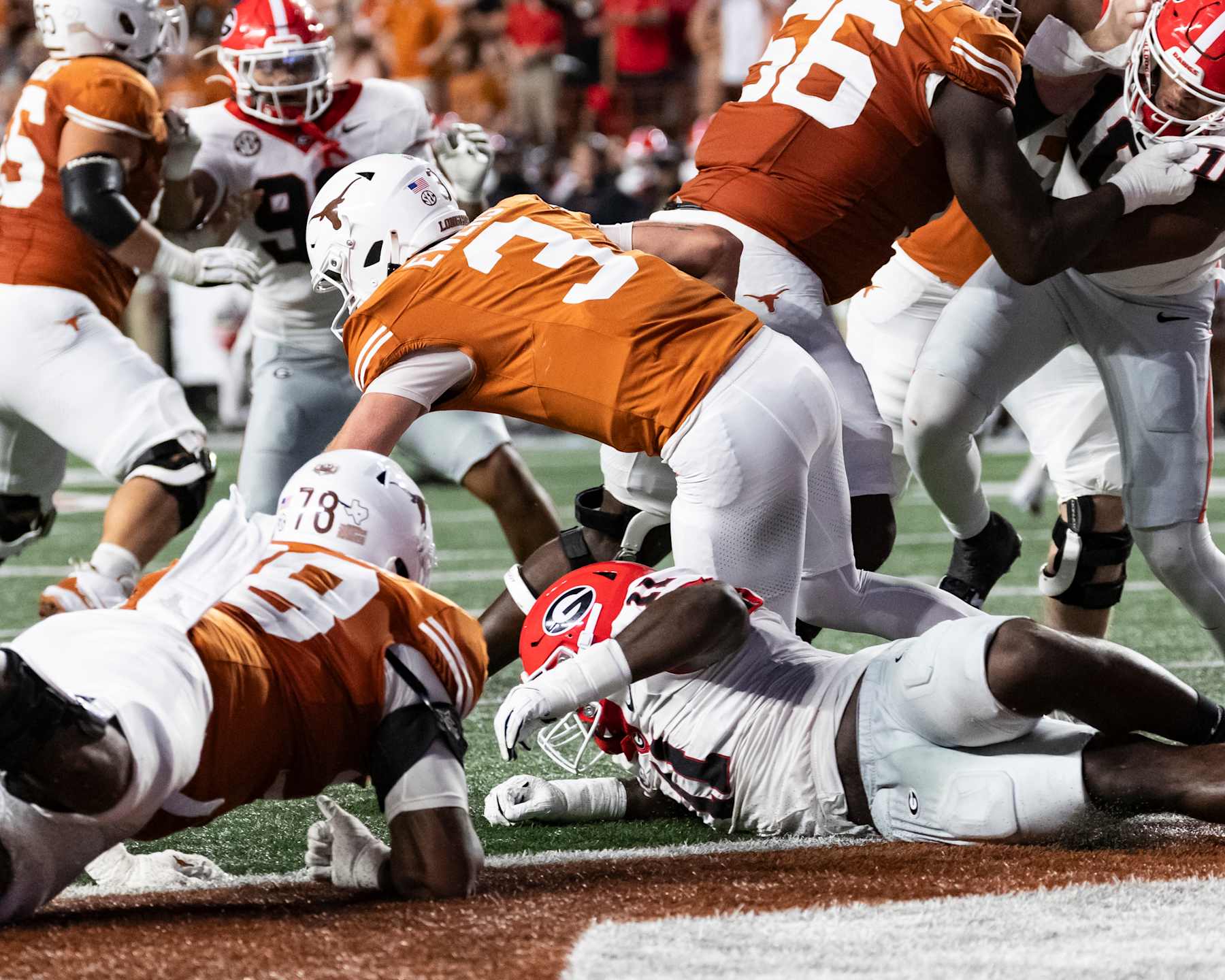 AUSTIN, TEXAS - OCTOBER 19: Quinn Ewers #3 of the Texas Longhorns is sacked by Jalon Walker #11 of the Georgia Bulldogs during a game between the between the Georgia Bulldogs and the Texas Longhorns at Darrell K Royal-Texas Memorial Stadium on October 19, 2024 in Austin, Texas. (Photo by Steve Limentani/ISI Photos/Getty Images)
