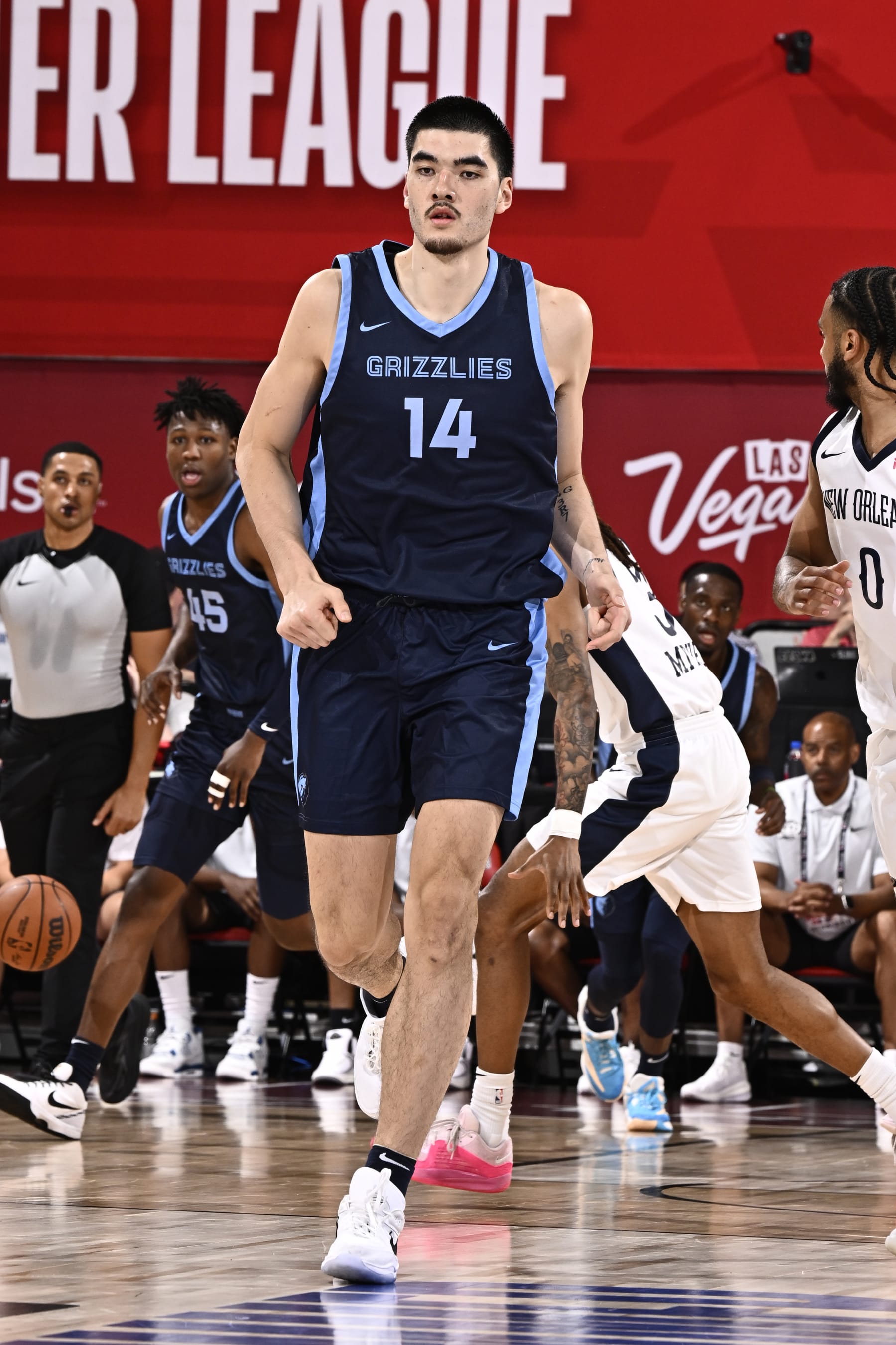 LAS VEGAS, NV - JULY 18: Zach Edey #14 of the Memphis Grizzlies looks on during the game against the New Orleans Pelicans on July 18, 2024 at the Cox Pavilion in Las Vegas, Nevada. NOTE TO USER: User expressly acknowledges and agrees that, by downloading and or using this photograph, User is consenting to the terms and conditions of the Getty Images License Agreement. Mandatory Copyright Notice: Copyright 2024 NBAE (Photo by David Dow/NBAE via Getty Images)