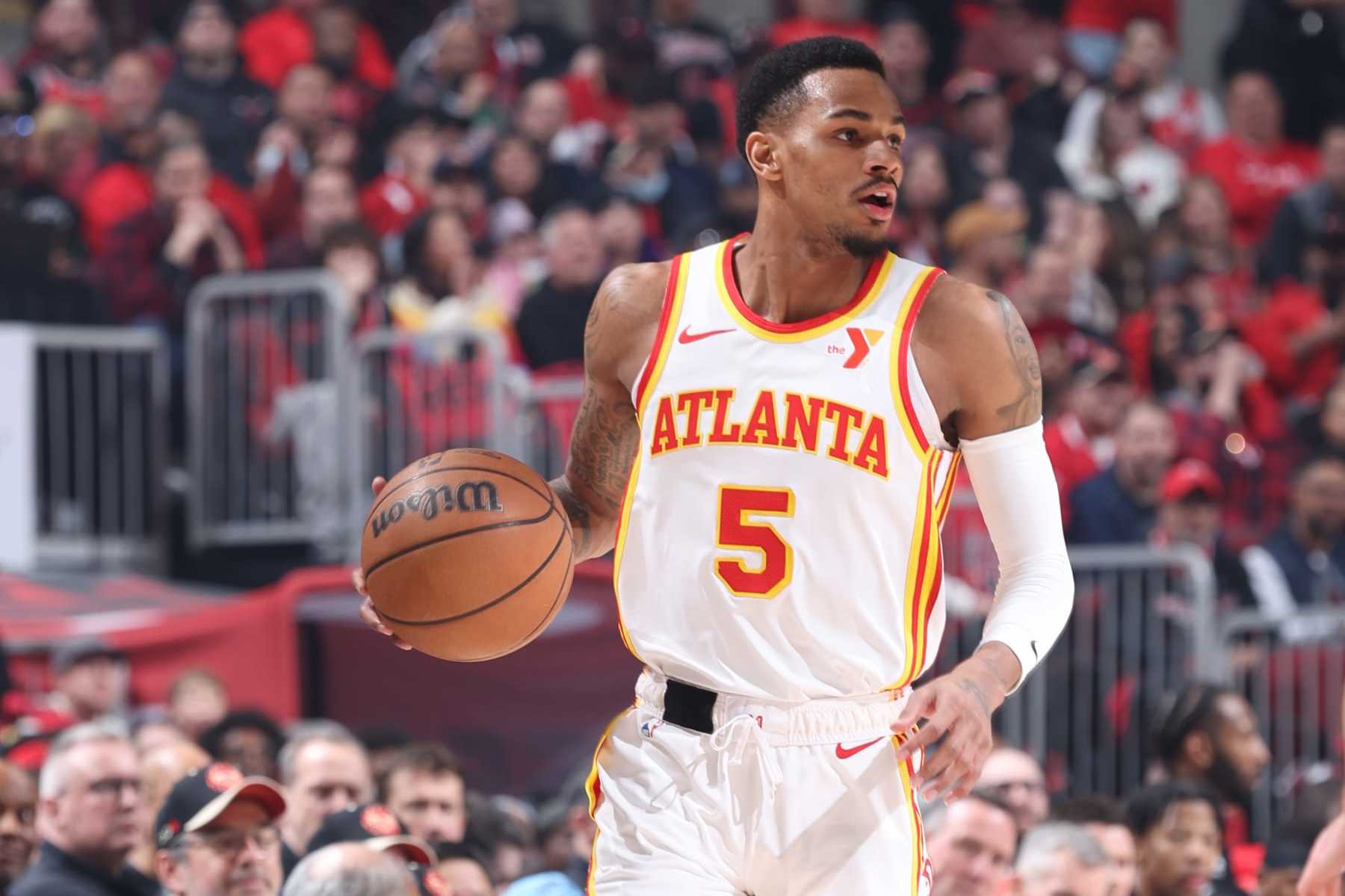 CHICAGO, IL - APRIL 17: Dejounte Murray #5 of the Atlanta Hawks handles the ball during the game against the Chicago Bulls during the 2024 Play-In Tournament on April 17, 2024 at United Center in Chicago, Illinois. NOTE TO USER: User expressly acknowledges and agrees that, by downloading and or using this photograph, User is consenting to the terms and conditions of the Getty Images License Agreement. Mandatory Copyright Notice: Copyright 2024 NBAE (Photo by Jeff Haynes/NBAE via Getty Images)