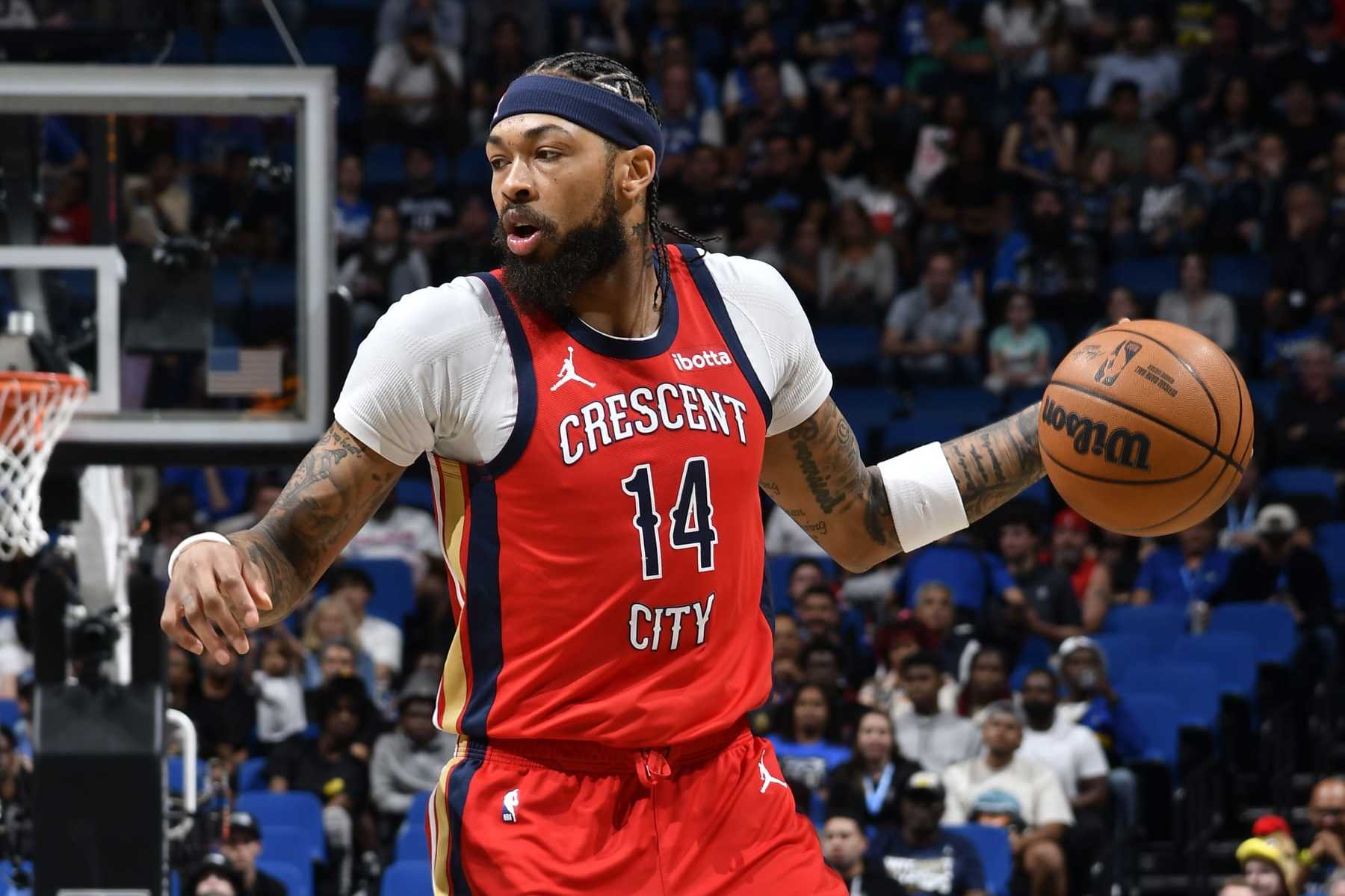 ORLANDO, FL - MARCH 21: Brandon Ingram #14 of the New Orleans Pelicans dribbles the ball during the game against the Orlando Magic on March 21, 2024 at Amway Center in Orlando, Florida. NOTE TO USER: User expressly acknowledges and agrees that, by downloading and or using this photograph, User is consenting to the terms and conditions of the Getty Images License Agreement. Mandatory Copyright Notice: Copyright 2024 NBAE (Photo by Fernando Medina/NBAE via Getty Images)