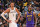 LOS ANGELES, CA - FEBRUARY 23: Victor Wembanyama #1 of the San Antonio Spurs and LeBron James #23 of the Los Angeles Lakers smile during the game on Feburary 23, 2024 at Crypto.Com Arena in Los Angeles, California. NOTE TO USER: User expressly acknowledges and agrees that, by downloading and/or using this Photograph, user is consenting to the terms and conditions of the Getty Images License Agreement. Mandatory Copyright Notice: Copyright 2024 NBAE (Photo by Andrew D. Bernstein/NBAE via Getty Images)