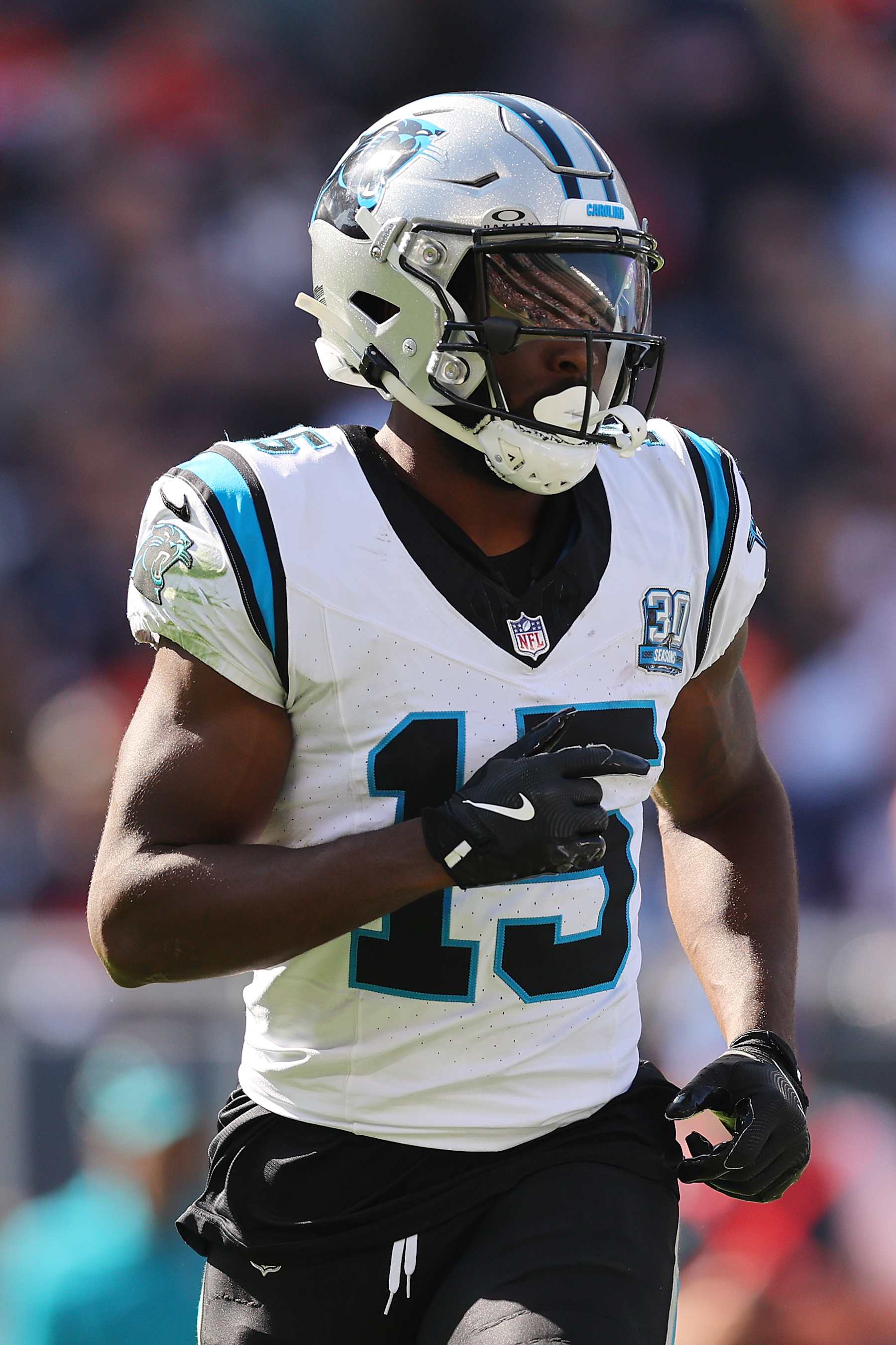 CHICAGO, ILLINOIS - OCTOBER 06: Jonathan Mingo #15 of the Carolina Panthers looks on against the Chicago Bears at Soldier Field on October 06, 2024 in Chicago, Illinois. (Photo by Michael Reaves/Getty Images)