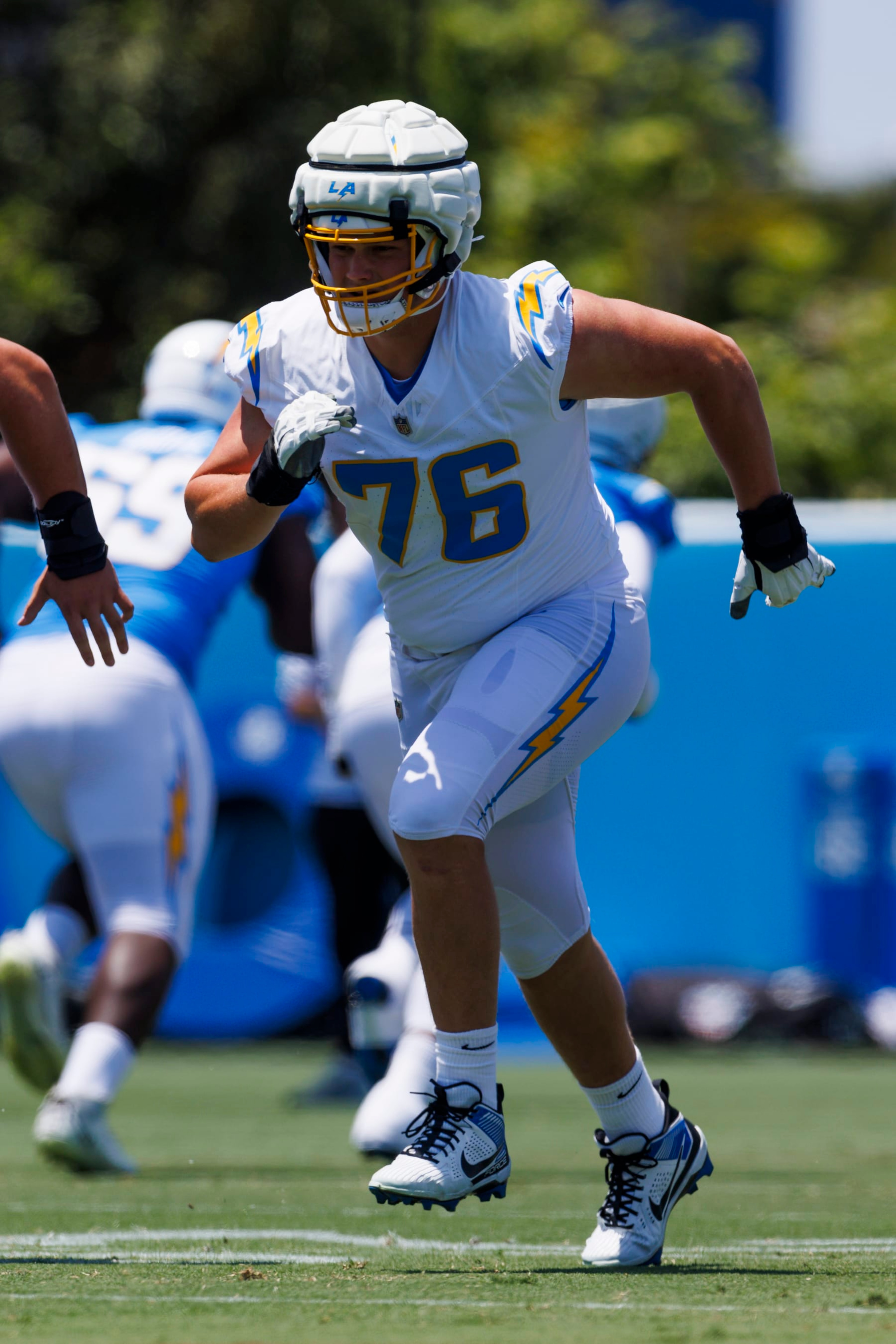 COSTA MESA, CALIFORNIA - MAY 29: Joe Alt #76 of the Los Angeles Chargers warms up during an NFL football organized team activity at Hoag Performance Center on May 29, 2024 in Costa Mesa, California. (Photo by Ric Tapia/Getty Images) COSTA MESA, CALIFORNIA - MAY 29: Joe Alt #76 of the Los Angeles Chargers warms up during an NFL football organized team activity at Hoag Performance Center on May 29, 2024 in Costa Mesa, California. (Photo by Ric Tapia/Getty Images)