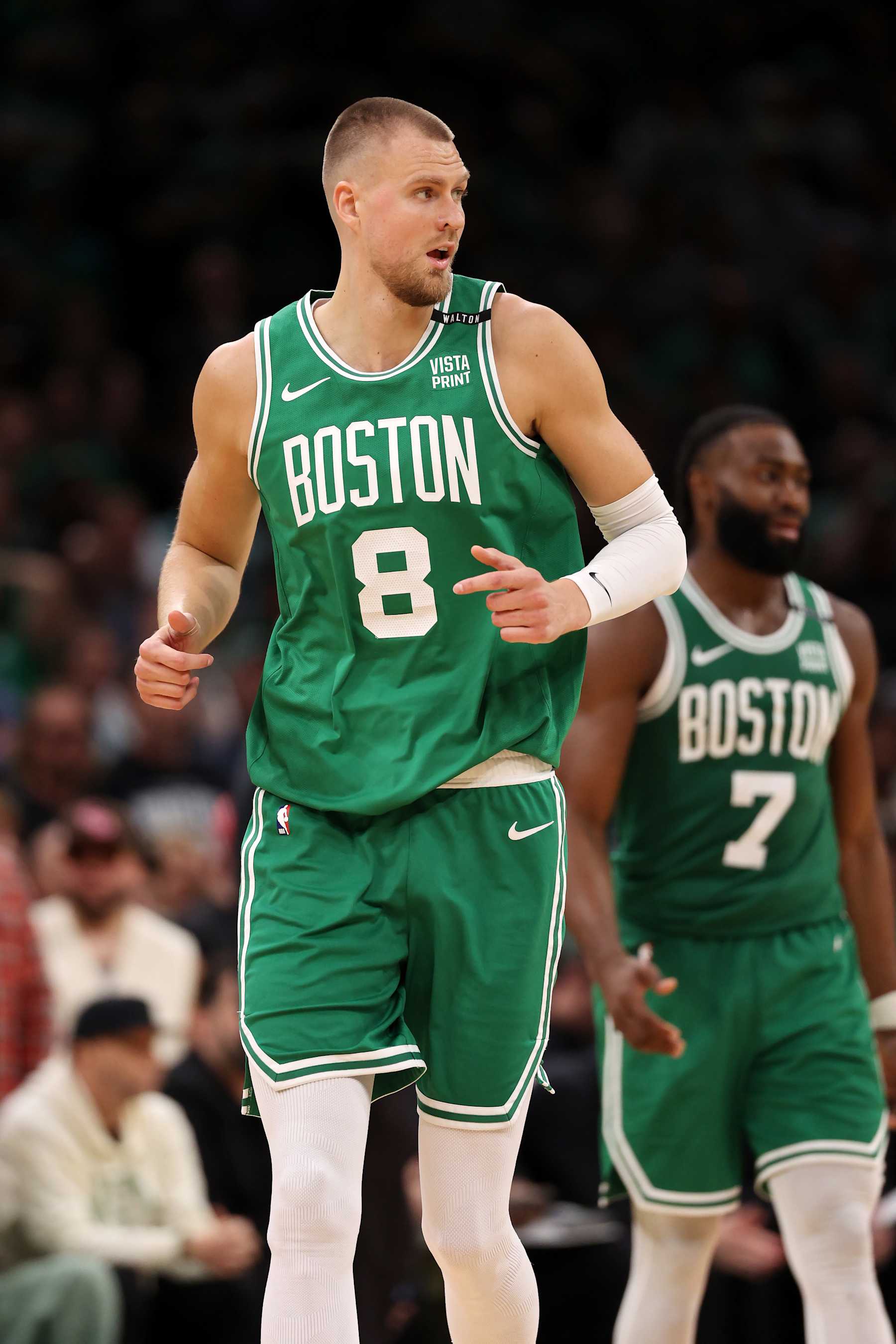 BOSTON, MASSACHUSETTS - JUNE 17: Kristaps Porzingis #8 of the Boston Celtics reacts against the Dallas Mavericks during the fourth quarter of Game Five of the 2024 NBA Finals at TD Garden on June 17, 2024 in Boston, Massachusetts. NOTE TO USER: User expressly acknowledges and agrees that, by downloading and or using this photograph, User is consenting to the terms and conditions of the Getty Images License Agreement. (Photo by Elsa/Getty Images)