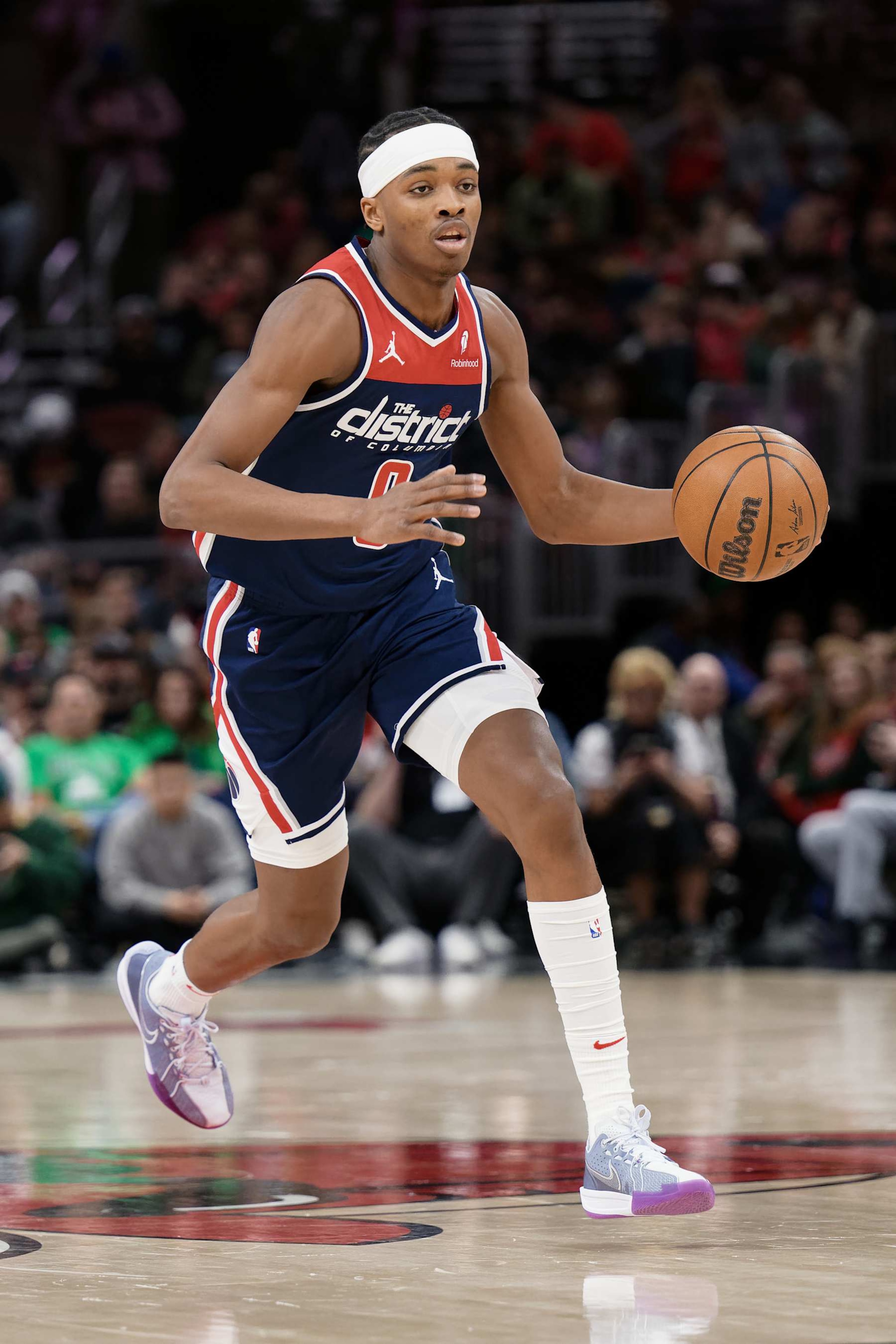 CHICAGO, ILLINOIS - MARCH 16:  Bilal Coulibaly #0 of the Washington Wizards controls the ball against the Chicago Bulls on March 16, 2024 at United Center in Chicago, Illinois. Chicago defeated Washington 127-98.   NOTE TO USER: User expressly acknowledges and agrees that, by downloading and or using this photograph, User is consenting to the terms and conditions of the Getty Images License Agreement.  (Photo by Jamie Sabau/Getty Images)