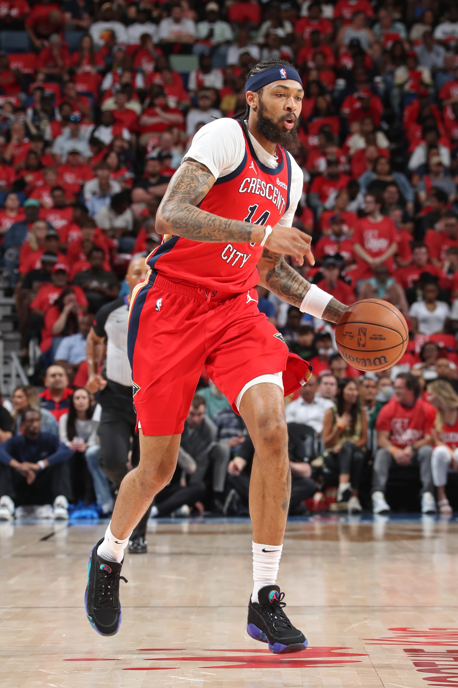 NEW ORLEANS, LA - APRIL 27: Brandon Ingram #14 of the New Orleans Pelicans looks on during the game against the Oklahoma City Thunder during Round 1 Game 3 of the 2024 NBA Playoffs on April 27, 2024 at the Smoothie King Center in New Orleans, Louisiana. NOTE TO USER: User expressly acknowledges and agrees that, by downloading and or using this Photograph, user is consenting to the terms and conditions of the Getty Images License Agreement. Mandatory Copyright Notice: Copyright 2024 NBAE (Photo by Layne Murdoch Jr./NBAE via Getty Images)