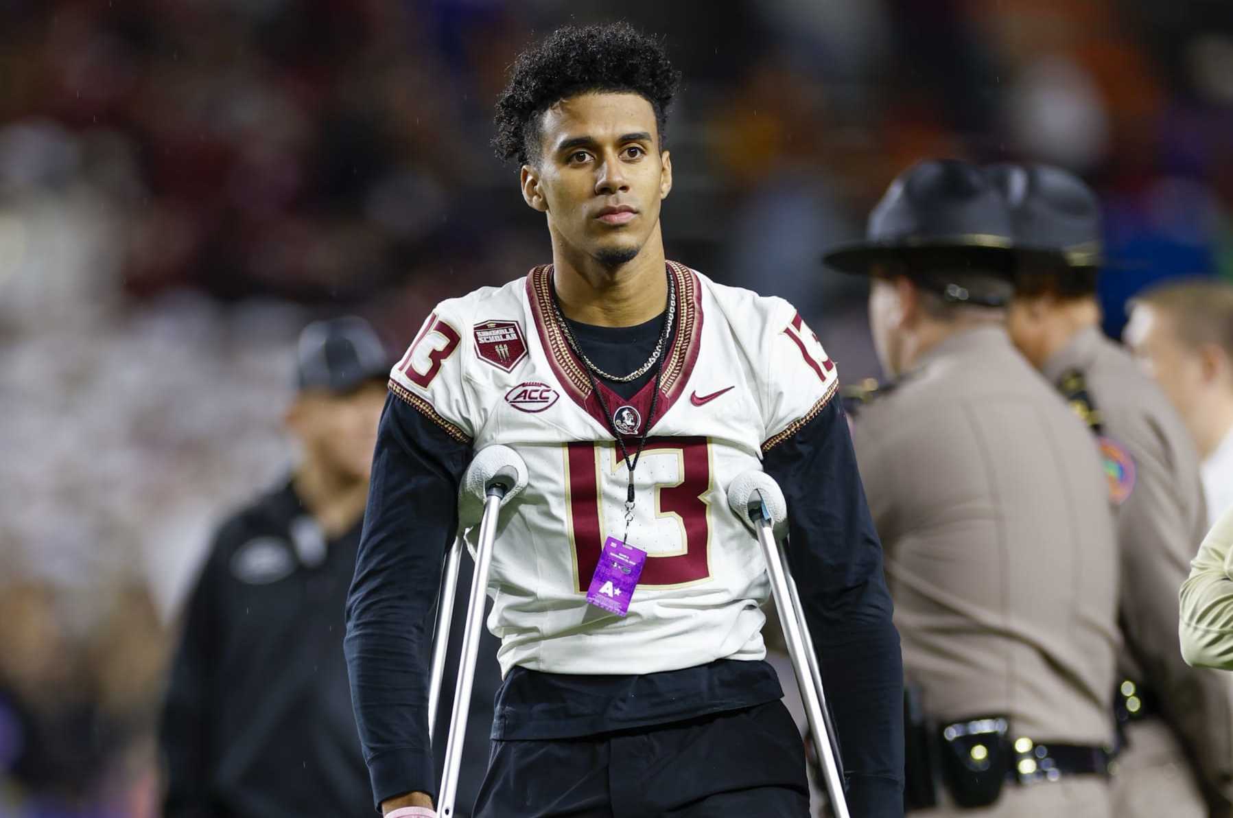 GAINESVILLE, FL - NOVEMBER 25: Florida State Seminoles quarterback Jordan Travis (13) looks on before the game between the Florida Gators and the Florida State Seminoles on November 25, 2023 at Ben Hill Griffin Stadium at Florida Field in Gainesville, Fl. (Photo by David Rosenblum/Icon Sportswire via Getty Images)