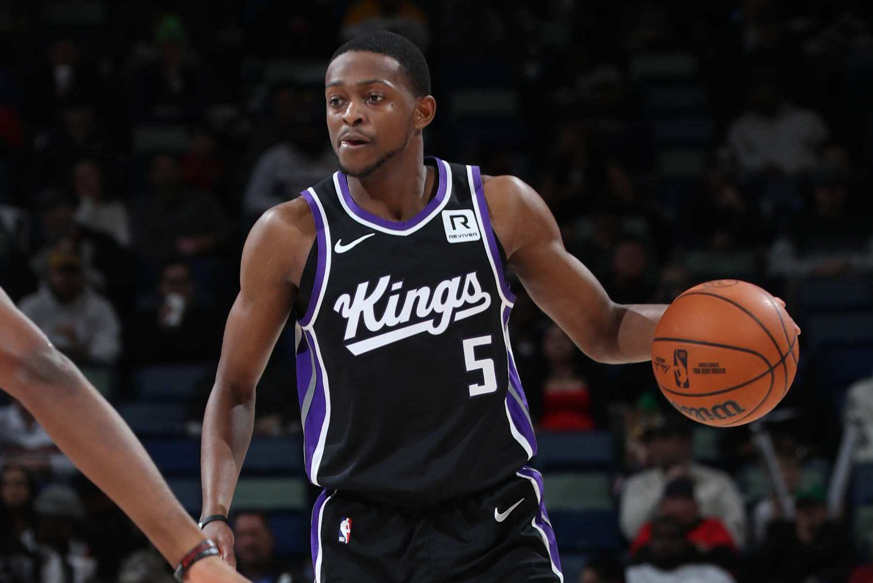 NEW ORLEANS, LA - DECEMBER 12: De'Aaron Fox #5 of the Sacramento Kings dribbles the ball during the game against the New Orleans Pelicans on December 12, 2024 at the Smoothie King Center in New Orleans, Louisiana. NOTE TO USER: User expressly acknowledges and agrees that, by downloading and or using this Photograph, user is consenting to the terms and conditions of the Getty Images License Agreement. Mandatory Copyright Notice: Copyright 2024 NBAE (Photo by Layne Murdoch Jr./NBAE via Getty Images)