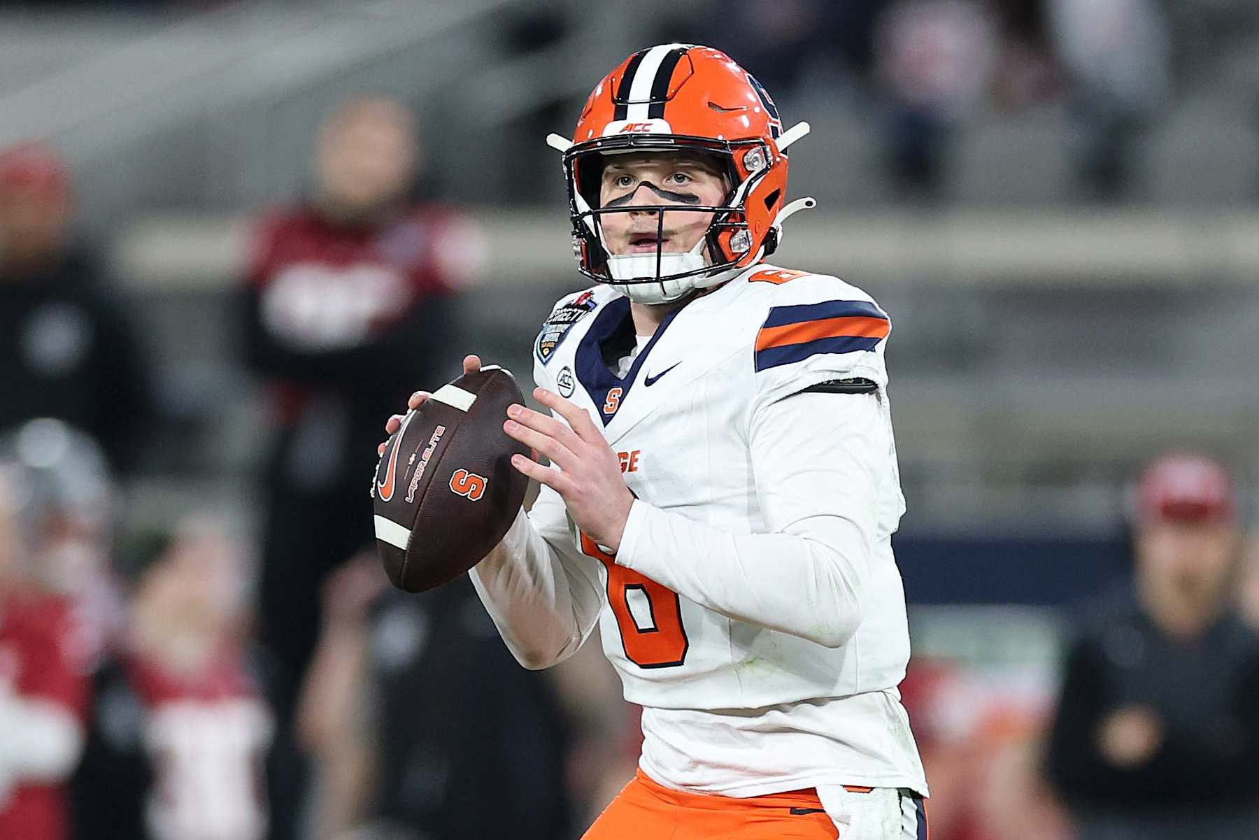 SAN DIEGO, CALIFORNIA - DECEMBER 27: Kyle McCord #6 of the Syracuse Orange drops back to pass during the first half of the DirecTV Holiday Bowl against the Washington State Cougars at Snapdragon Stadium on December 27, 2024 in San Diego, California. (Photo by Sean M. Haffey/Getty Images)