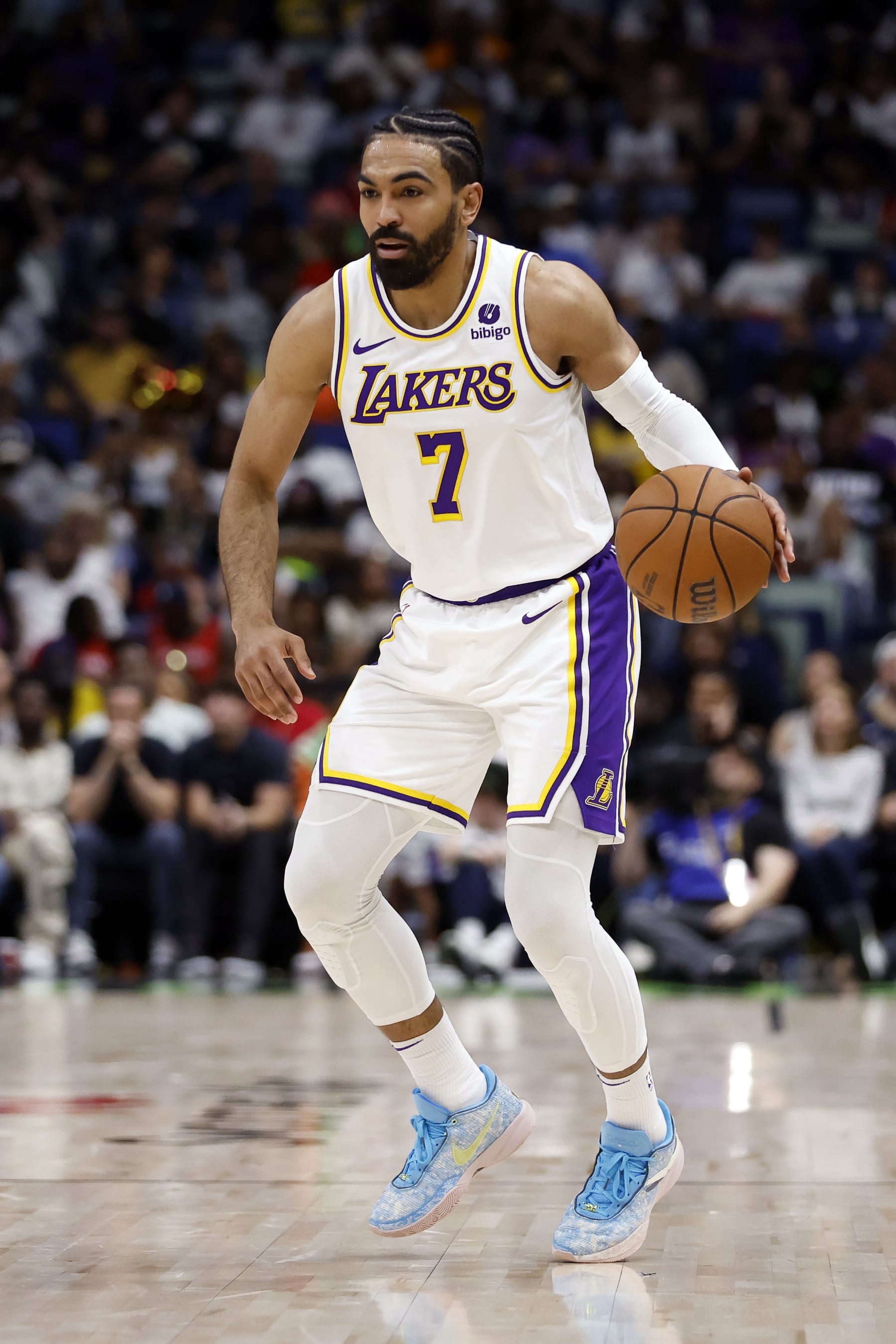 NEW ORLEANS, LOUISIANA - APRIL 14: Gabe Vincent #7 of the Los Angeles Lakers handles the ball during a game against the New Orleans Pelicans at Smoothie King Center on April 14, 2024 in New Orleans, Louisiana.  The Lakers defeated the Pelicans 124-108.  NOTE TO USER: User expressly acknowledges and agrees that, by downloading and or using this photograph, User is consenting to the terms and conditions of the Getty Images License Agreement. (Photo by Tyler Kaufman/Getty Images)