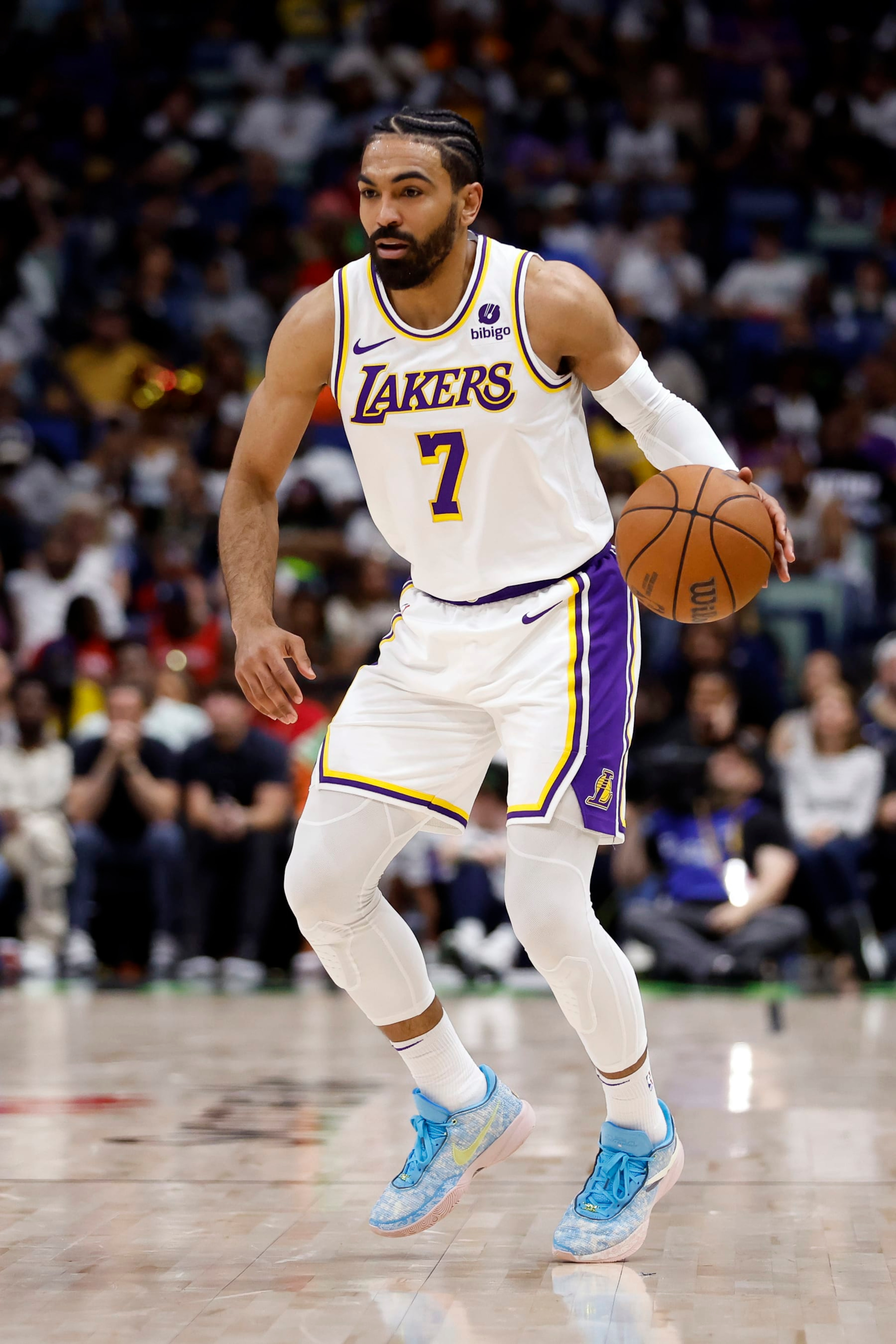 NEW ORLEANS, LOUISIANA - APRIL 14: Gabe Vincent #7 of the Los Angeles Lakers handles the ball during a game against the New Orleans Pelicans at Smoothie King Center on April 14, 2024 in New Orleans, Louisiana.  The Lakers defeated the Pelicans 124-108.  NOTE TO USER: User expressly acknowledges and agrees that, by downloading and or using this photograph, User is consenting to the terms and conditions of the Getty Images License Agreement. (Photo by Tyler Kaufman/Getty Images)