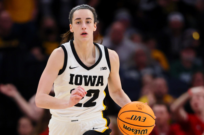 MINNEAPOLIS, MINNESOTA - MARCH 10: Caitlin Clark #22 of the Iowa Hawkeyes dribbles against the Nebraska Cornhuskers in the second half during the Big Ten Women's Basketball Tournament Championship at Target Center on March 10, 2024 in Minneapolis, Minnesota. (Photo by Adam Bettcher/Getty Images)
