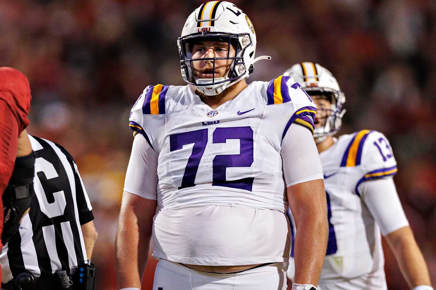 FAYETTEVILLE, ARKANSAS - OCTOBER 19: Garrett Dellinger #72 of the LSU Tigers at the line of scrimmage during a game against the Arkansas Razorbacks at Donald W. Reynolds Razorback Stadium on October 19, 2024 in Fayetteville, Arkansas. The Tigers defeated the Razorbacks 34-10.  (Photo by Wesley Hitt/Getty Images)