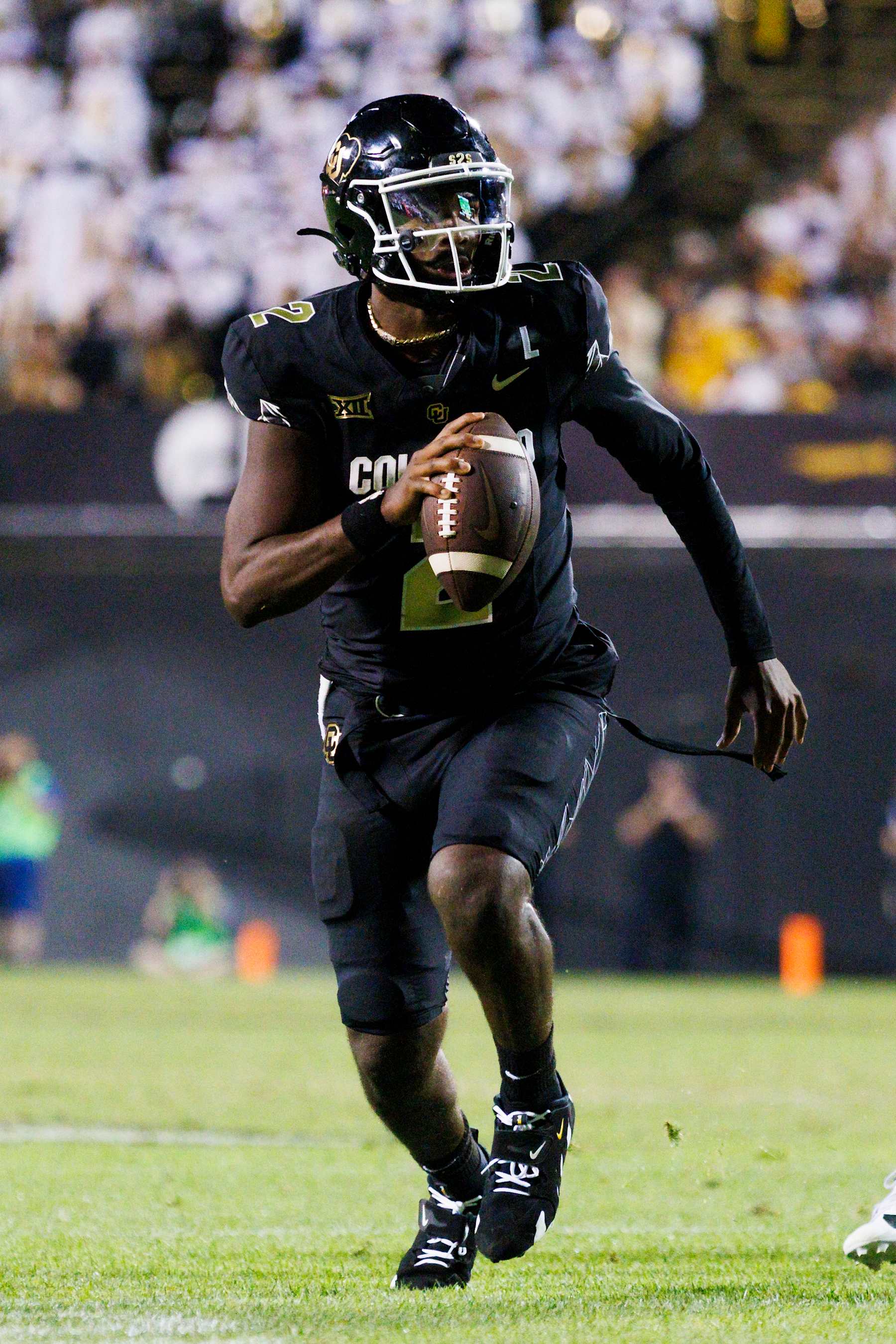 BOULDER, COLORADO - AUGUST 29: Shedeur Sanders #2 of the Colorado Buffaloes scrambles with the ball during a game against North Dakota State Bison at Folsom Field on August 29, 2024 in Boulder, Colorado. (Photo by Ric Tapia/Getty Images)