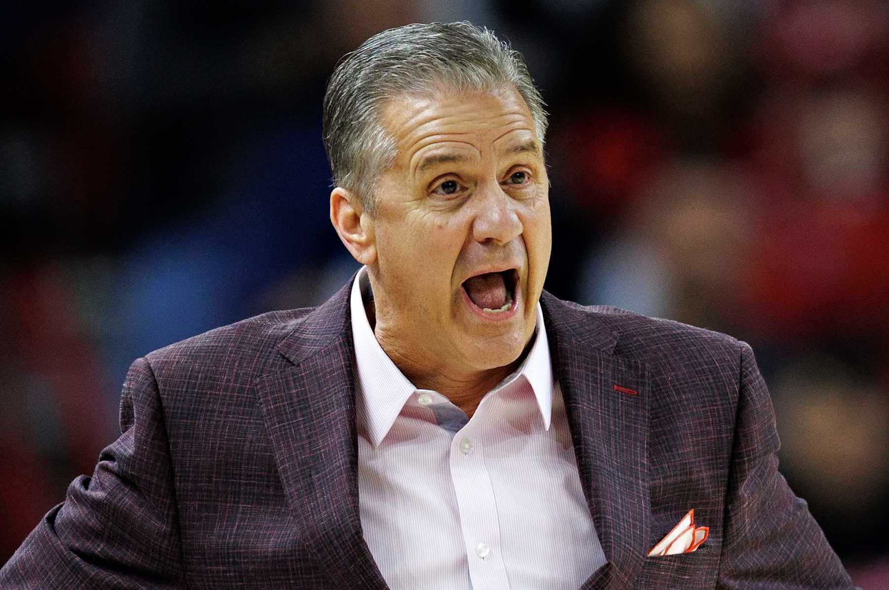 FAYETTEVILLE, ARKANSAS - JANUARY 08: Head Coach John Calipari of the Arkansas Razorbacks yells to his players during the first half of a game against the Ole Miss Rebels at Bud Walton Arena on January 08, 2025 in Fayetteville, Arkansas. (Photo by Wesley Hitt/Getty Images)