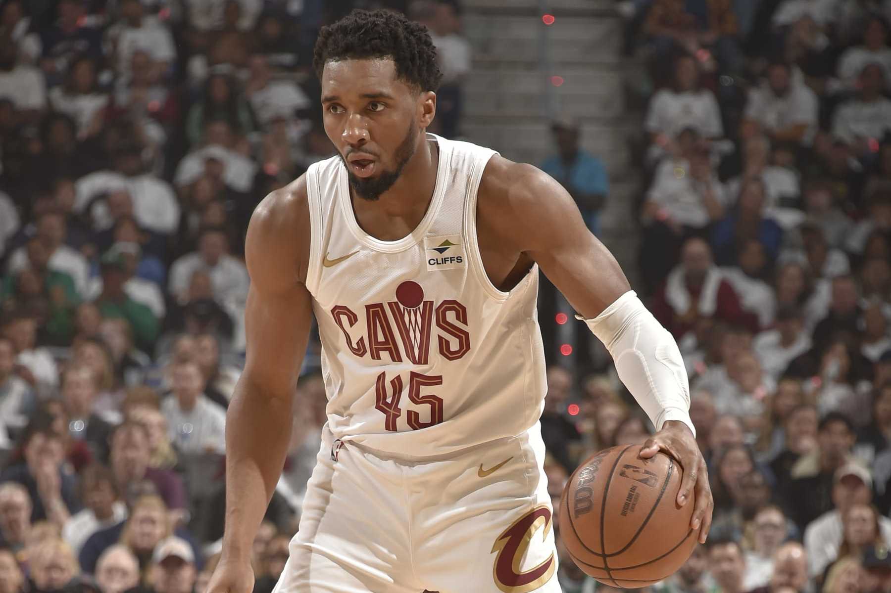CLEVELAND, OH - MAY 11: Donovan Mitchell #45 of the Cleveland Cavaliers dribbles the ball during the game against the Boston Celtics during Round 2 Game 3 of the 2024 NBA Playoffs on May 11, 2024 at Rocket Mortgage FieldHouse in Cleveland, Ohio. NOTE TO USER: User expressly acknowledges and agrees that, by downloading and/or using this Photograph, user is consenting to the terms and conditions of the Getty Images License Agreement. Mandatory Copyright Notice: Copyright 2024 NBAE (Photo by David Liam Kyle/NBAE via Getty Images)
