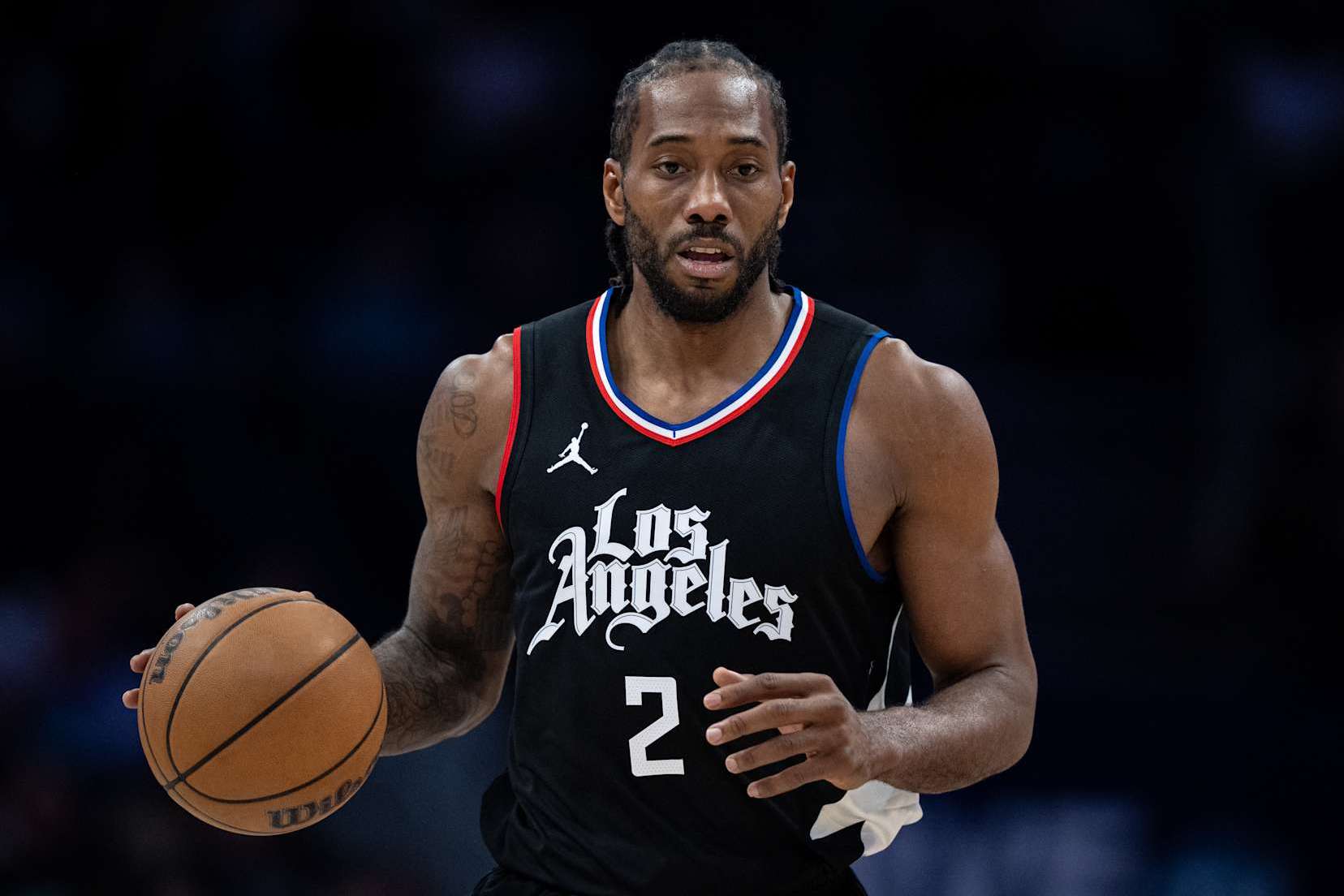 CHARLOTTE, NORTH CAROLINA - MARCH 31: Kawhi Leonard #2 of the LA Clippers brings the ball up court against the Charlotte Hornets during their game at Spectrum Center on March 31, 2024 in Charlotte, North Carolina. NOTE TO USER: User expressly acknowledges and agrees that, by downloading and or using this photograph, User is consenting to the terms and conditions of the Getty Images License Agreement. (Photo by Jacob Kupferman/Getty Images)