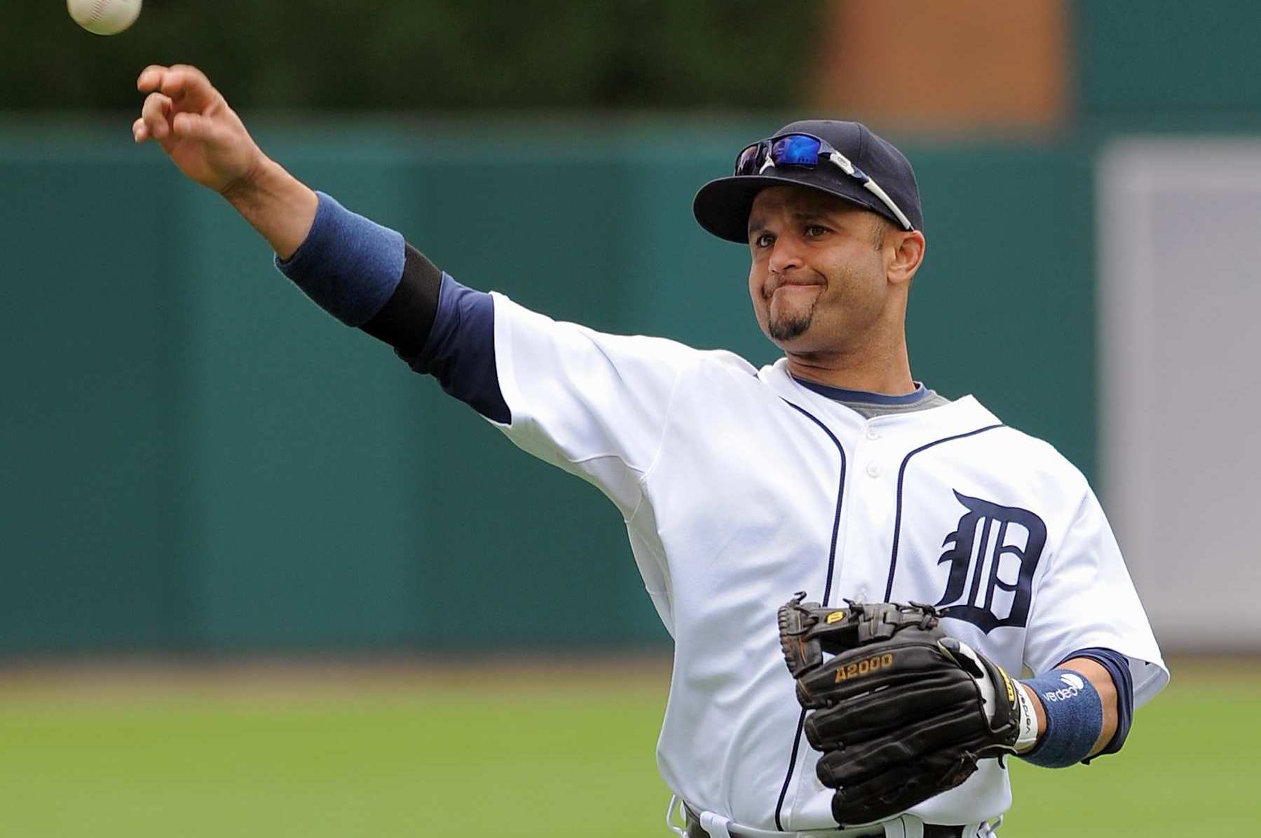 DETROIT - AUGUST 30: Placido Polanco #14 of the Detroit Tigers throws to first base against the Tampa Bay Rays during the game at Comerica Park on August 30, 2009 in Detroit, Michigan. The Tigers defeated the Rays 4-3. (Photo by Mark Cunningham/MLB Photos via Getty Images)
