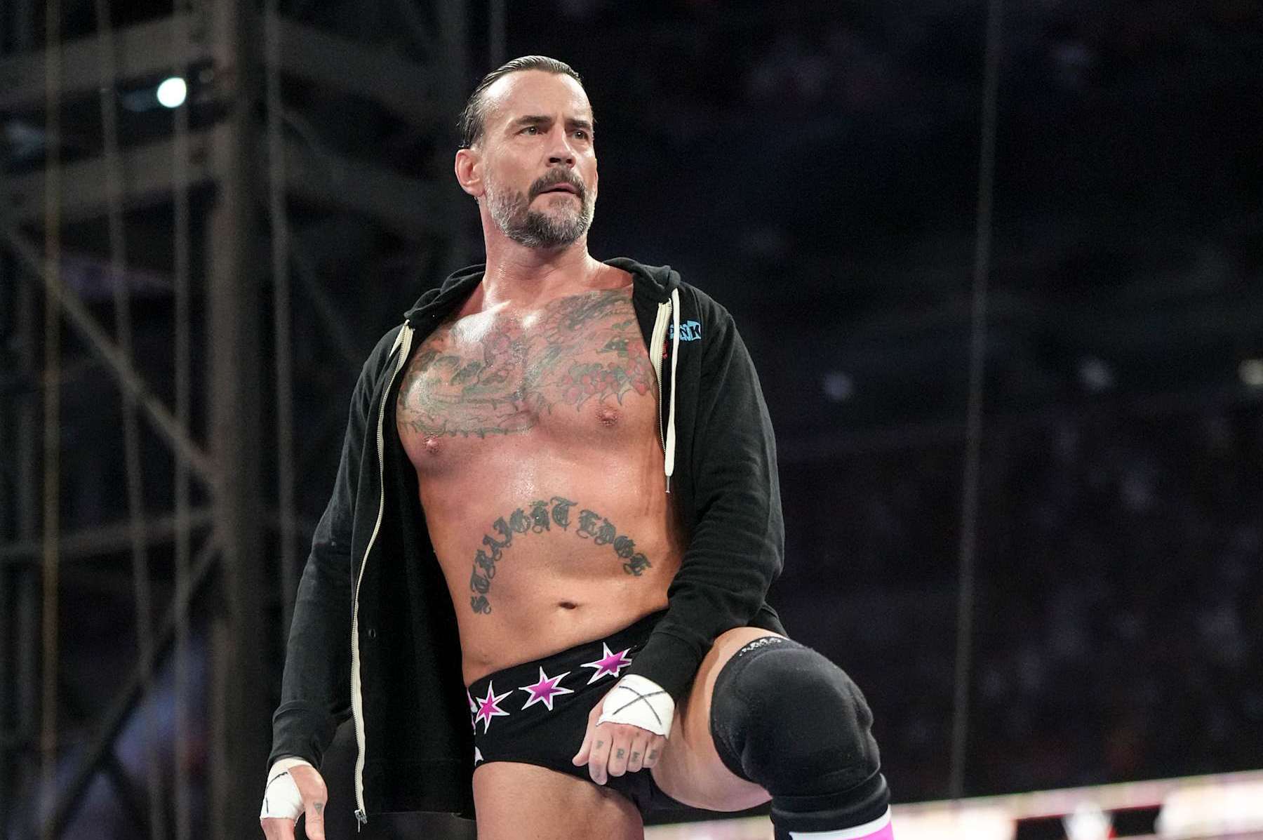 CLEVELAND, OHIO - AUGUST 03: CM Punk enters the ring during SummerSlam at Cleveland Browns Stadium on August 3, 2024 in Cleveland, Ohio. (Photo by WWE/Getty Images)