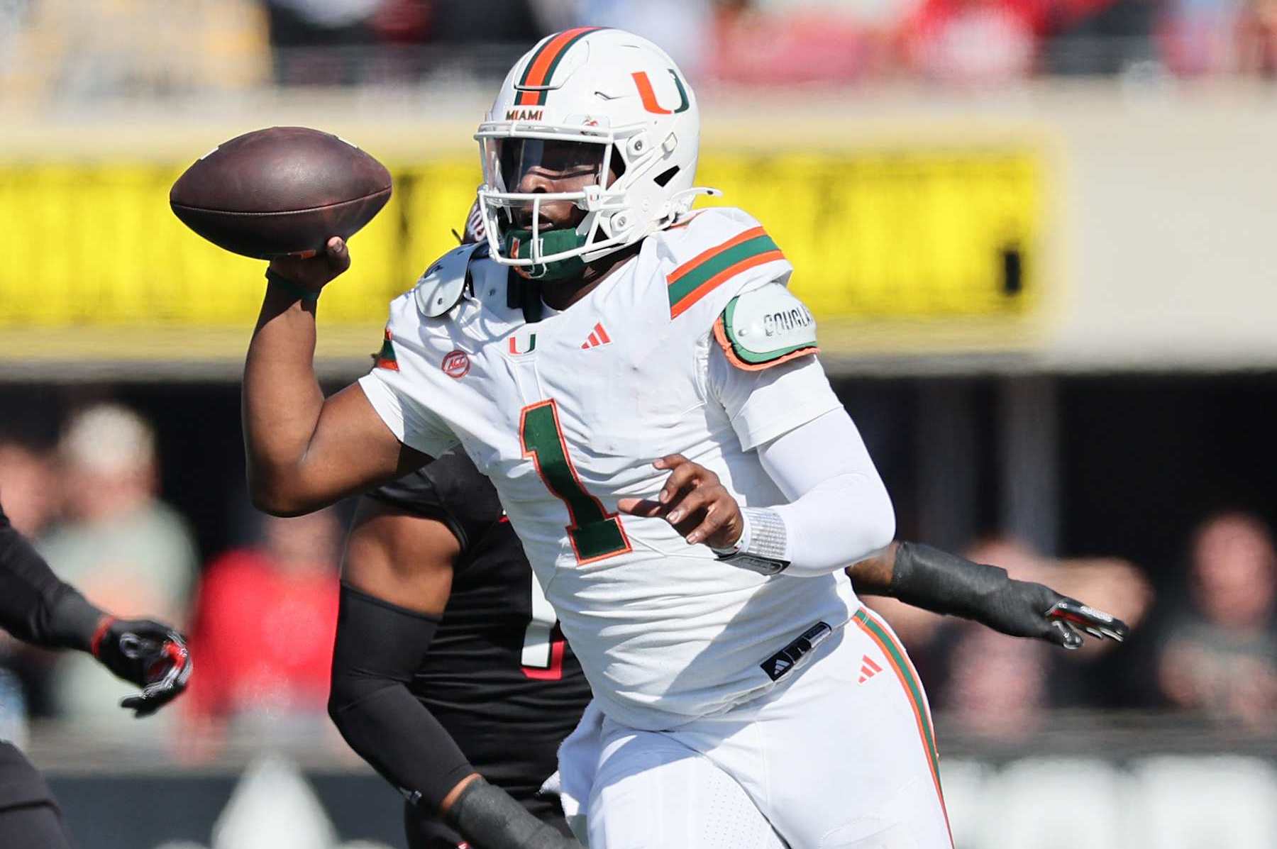 LOUISVILLE, KENTUCKY - OCTOBER 19: Cam Ward #1 of the Miami Hurricanes runs with the ball against the Louisville Cardinals at Cardinal Stadium on October 19, 2024 in Louisville, Kentucky. (Photo by Andy Lyons/Getty Images)
