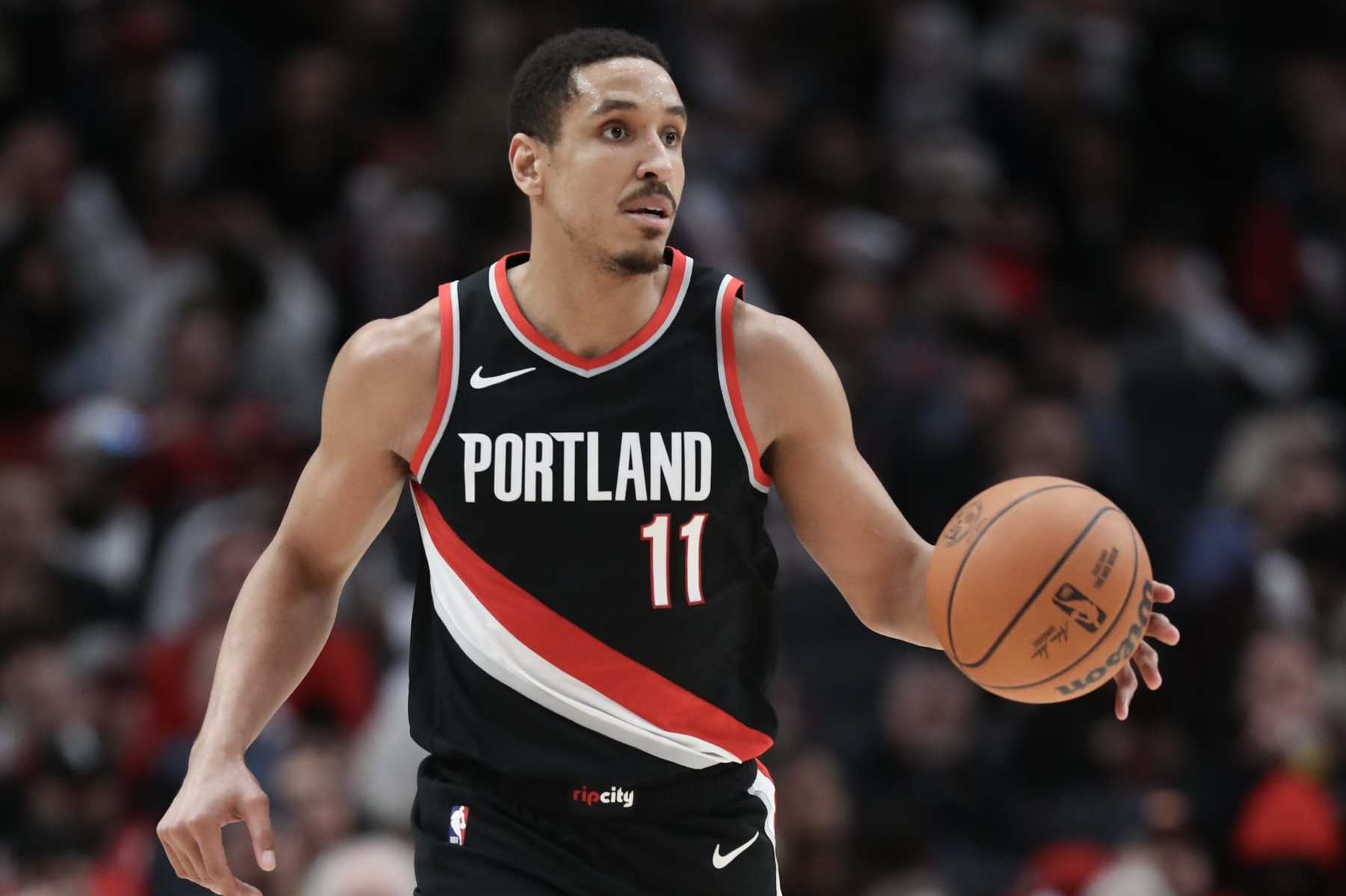 PORTLAND, OREGON - JANUARY 28: Malcolm Brogdon #11 of the Portland Trail Blazers plays against the Chicago Bulls during the third quarter at Moda Center on January 28, 2024 in Portland, Oregon. NOTE TO USER: User expressly acknowledges and agrees that, by downloading and or using this photograph, User is consenting to the terms and conditions of the Getty Images License Agreement. (Photo by Amanda Loman/Getty Images)