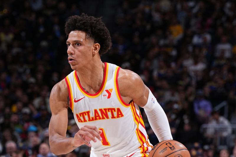 DENVER, CO - APRIL 6: Jalen Johnson #1 of the Atlanta Hawks dribbles the ball during the game against the Denver Nuggets on April 6, 2024 at the Ball Arena in Denver, Colorado. NOTE TO USER: User expressly acknowledges and agrees that, by downloading and/or using this Photograph, user is consenting to the terms and conditions of the Getty Images License Agreement. Mandatory Copyright Notice: Copyright 2024 NBAE (Photo by Garrett Ellwood/NBAE via Getty Images)