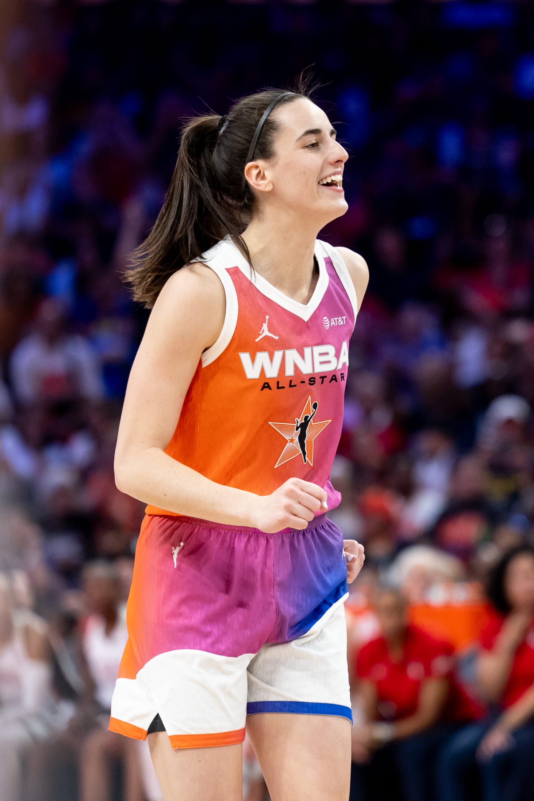 PHOENIX, AZ - JULY 20: Caitlin Clark #22 of Team WNBA celebrates during the 2024 WNBA All Star Game at Footprint Center on July 20, 2024 in Phoenix, Arizona. NOTE TO USER: User expressly acknowledges and agrees that, by downloading and/or using this Photograph, user is consenting to the terms and conditions of the Getty Images License Agreement. Mandatory Copyright Notice: Copyright 2024 NBAE (Photo by Dylan Goodman/NBAE via Getty Images)